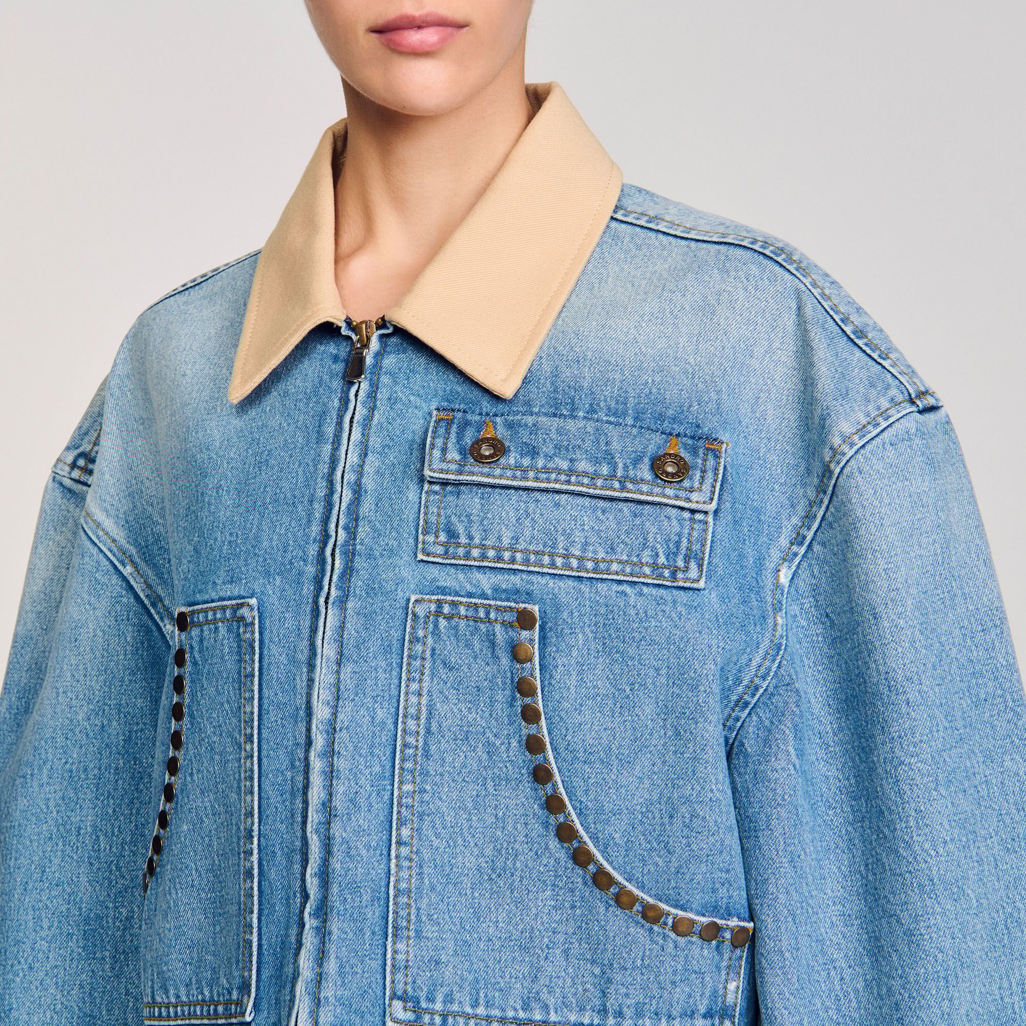 Denim jacket with studs