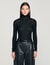 Layered turtleneck sweater