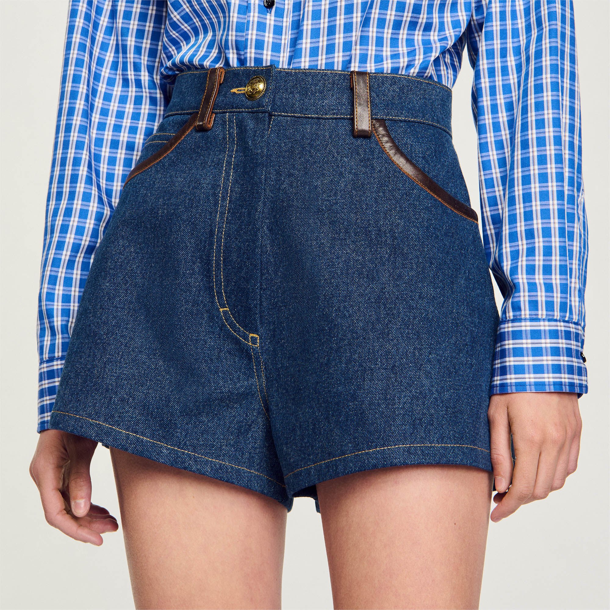 Denim shorts with leather details
