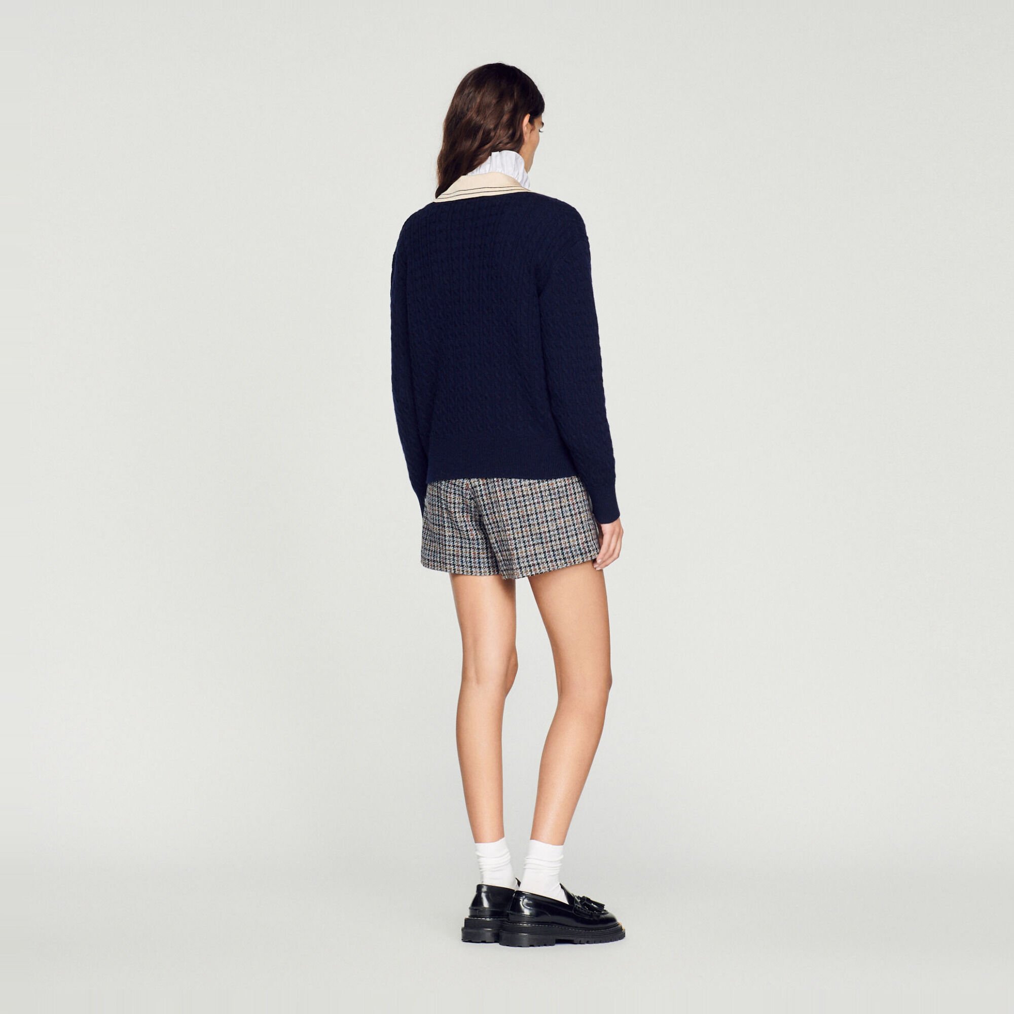 Cable knit sweater with low neckline