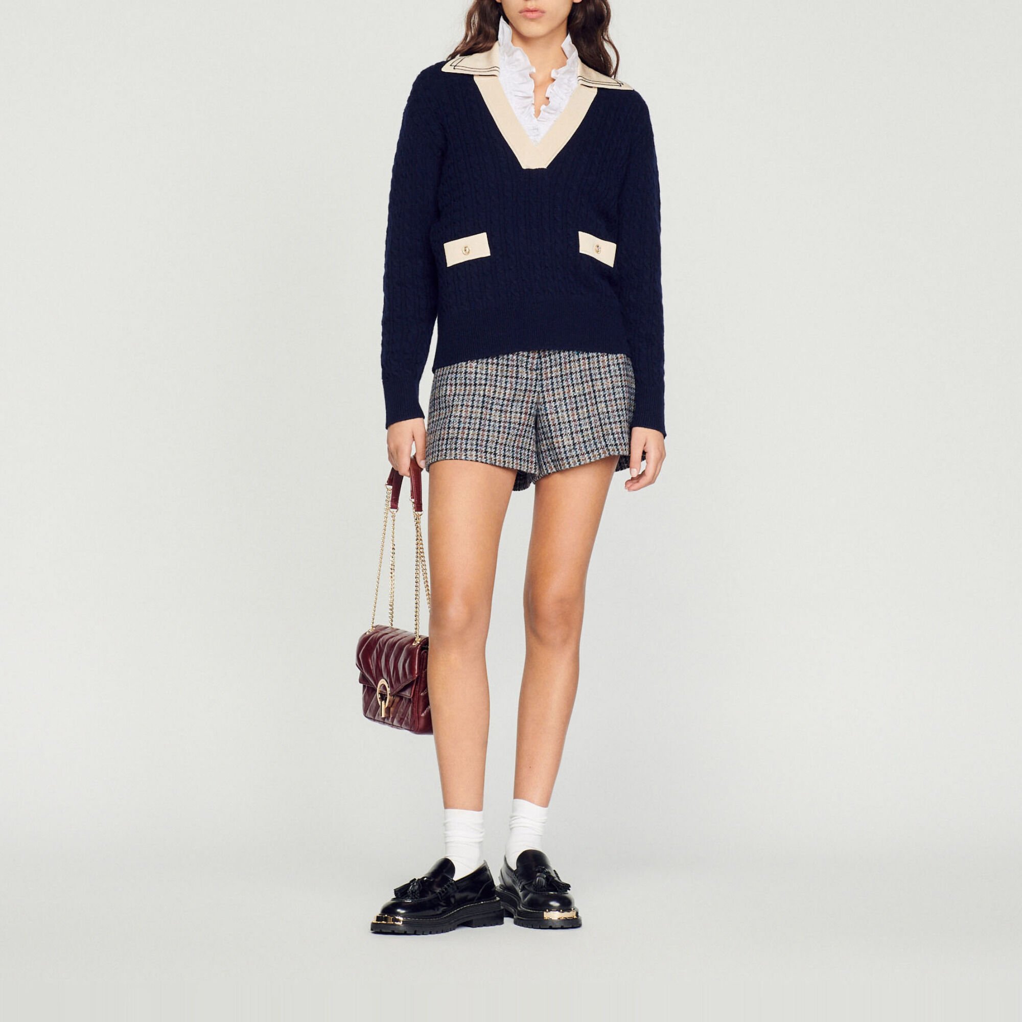 Cable knit sweater with low neckline
