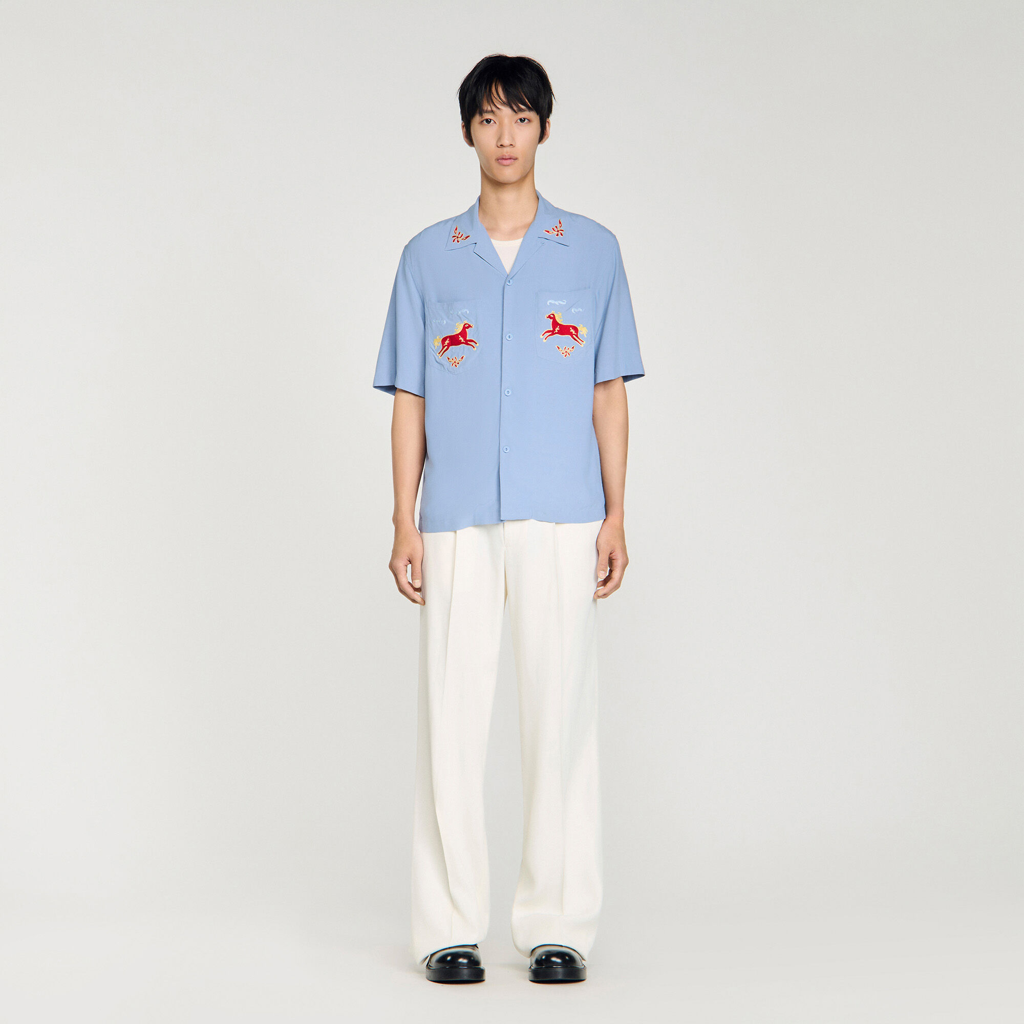 Embroidered horse loose-fit shirt in Chambray for Men | Sandro Paris