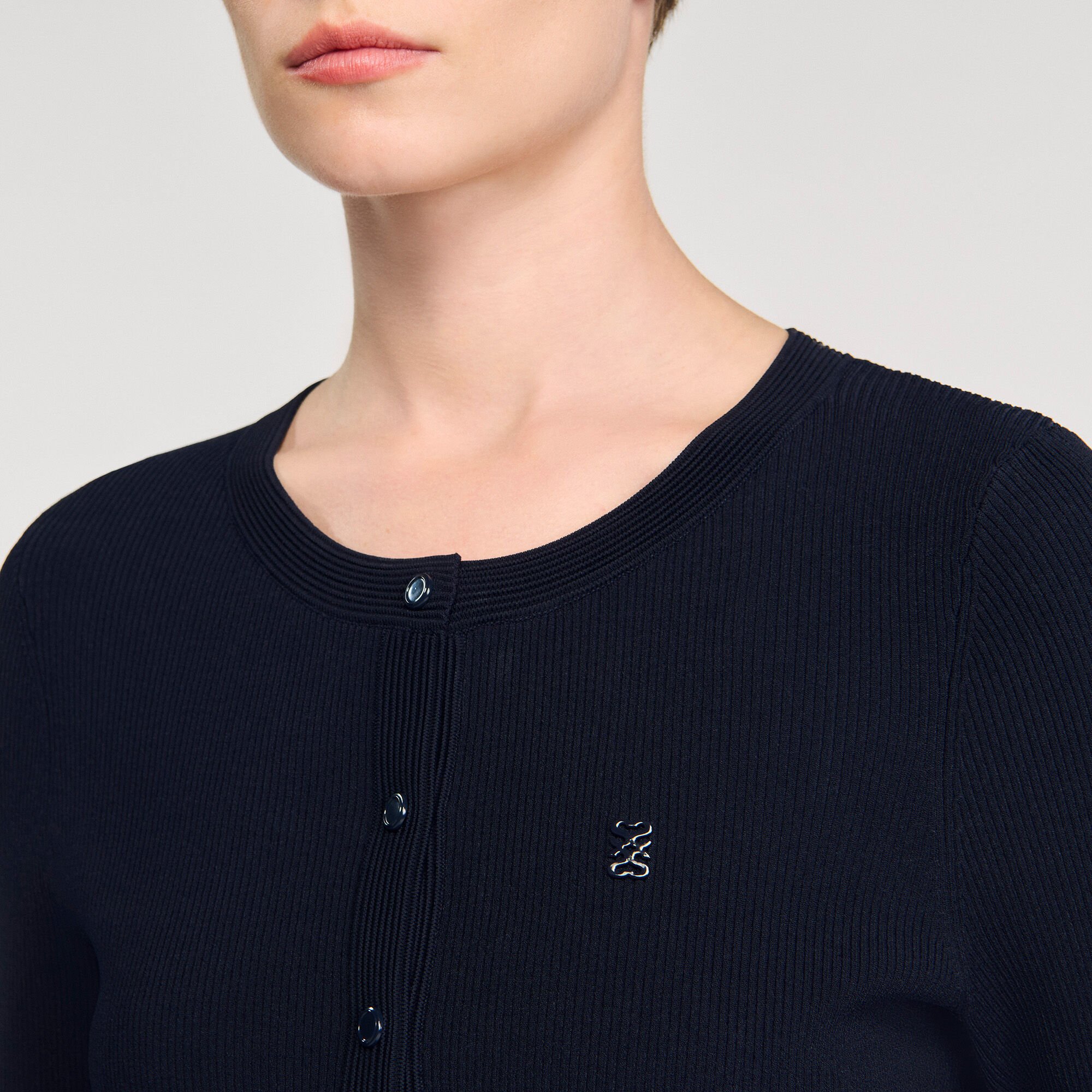 Polo shirt with decorative buttons