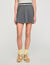 Buckle accent pleated skort