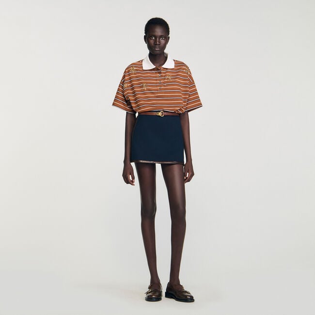 Mini skirt with leather bands