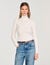 Cable-knit turtleneck sweater