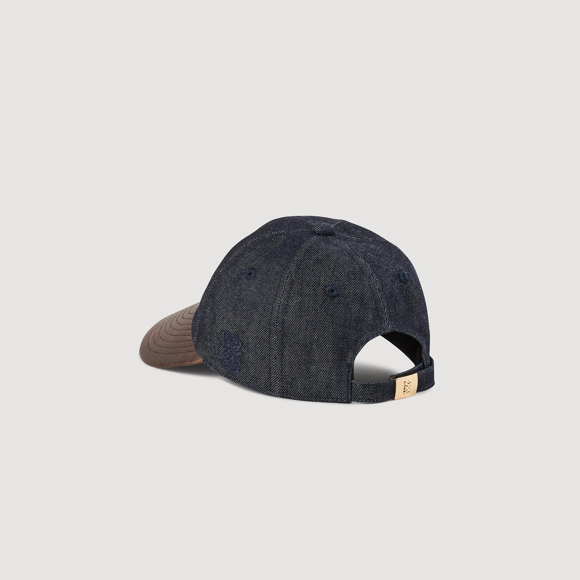 Denim and leather cap