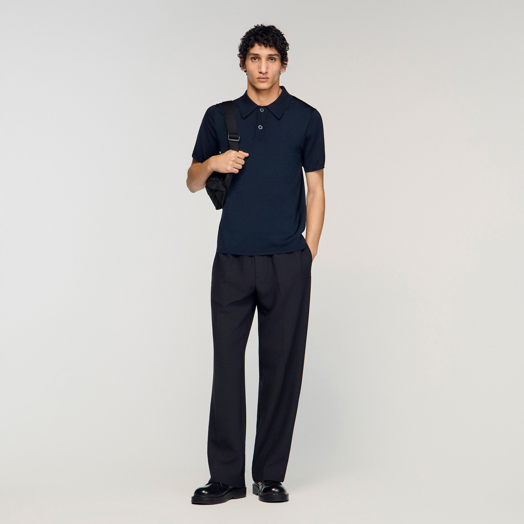 Short-sleeve knitted polo shirt in white for Men | Sandro Paris