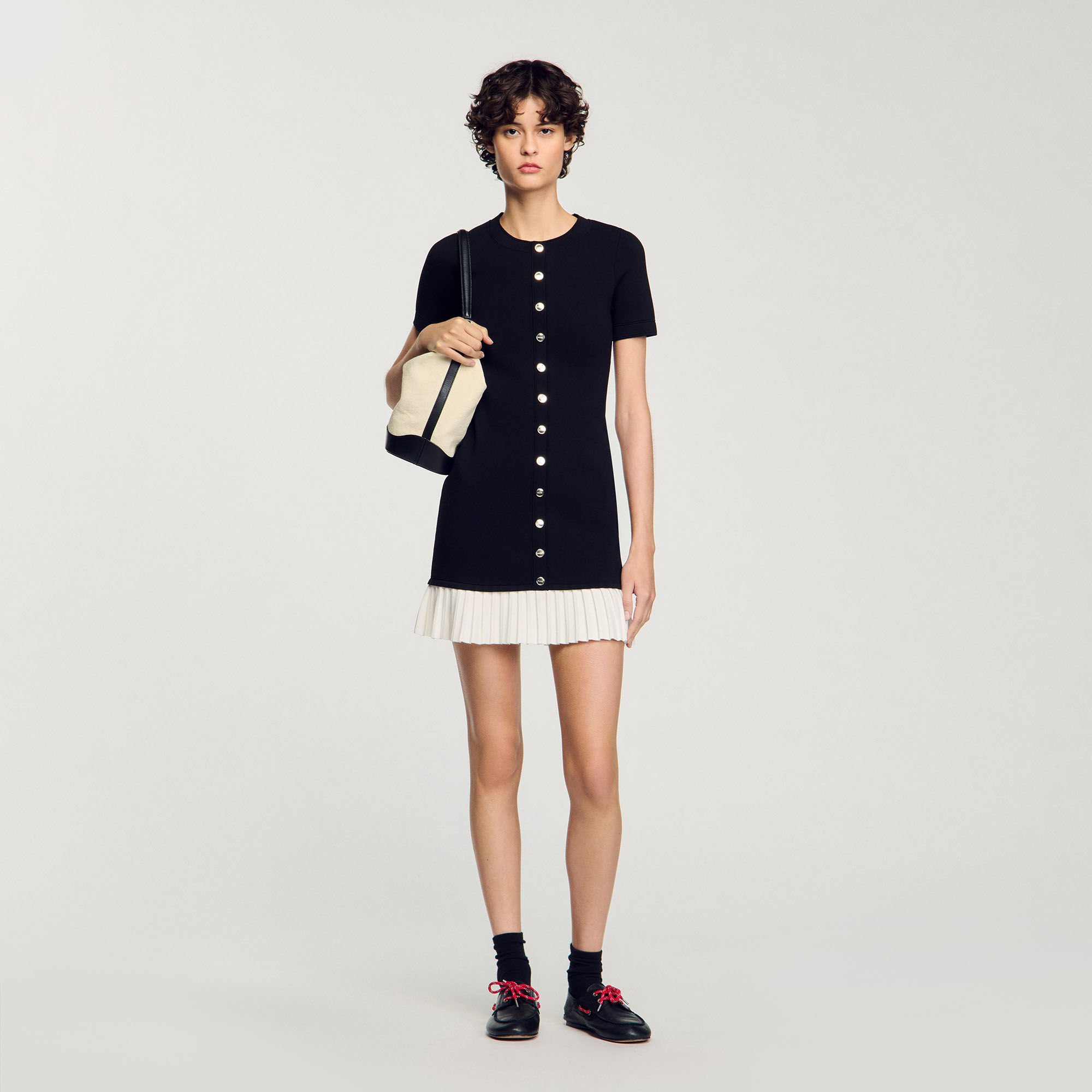 Mini knit dress with ruffle
