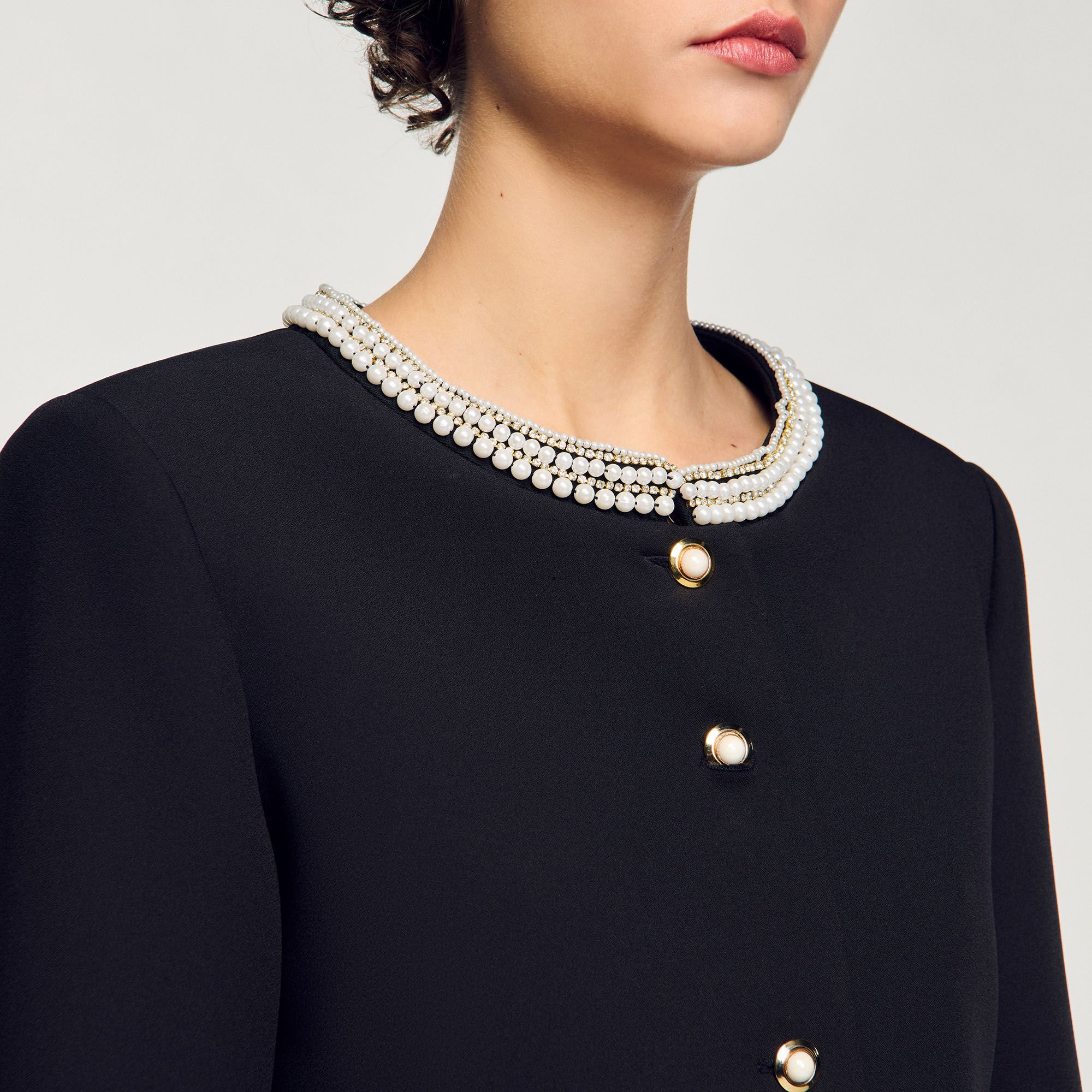 Jacket with beaded collar