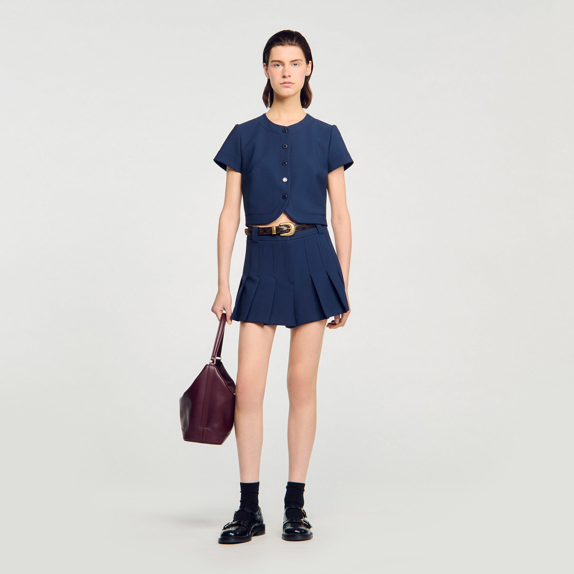 Rounded hem buttoned crop top
