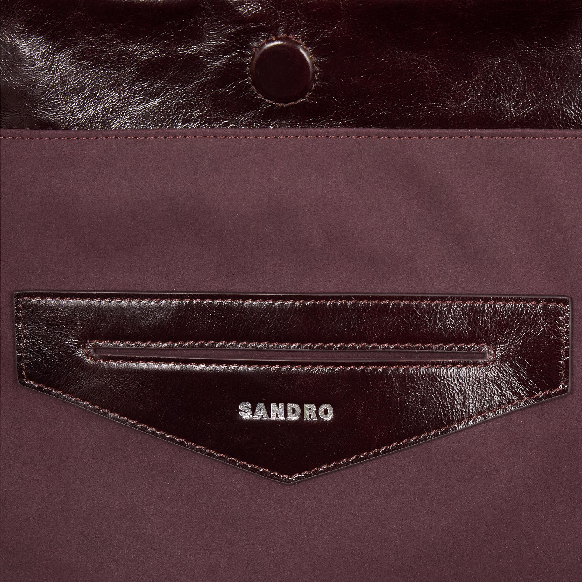 Large shiny leather bag