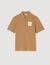 Polo shirt with flower patch