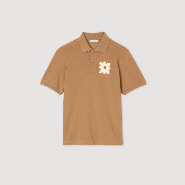 Polo shirt with flower patch