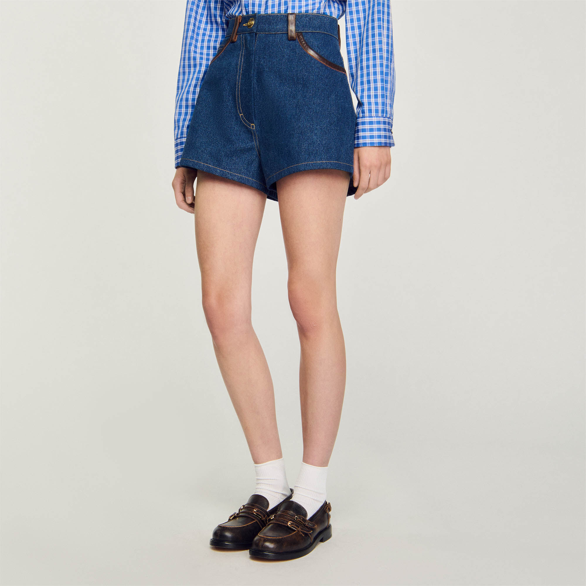 Denim shorts with leather details