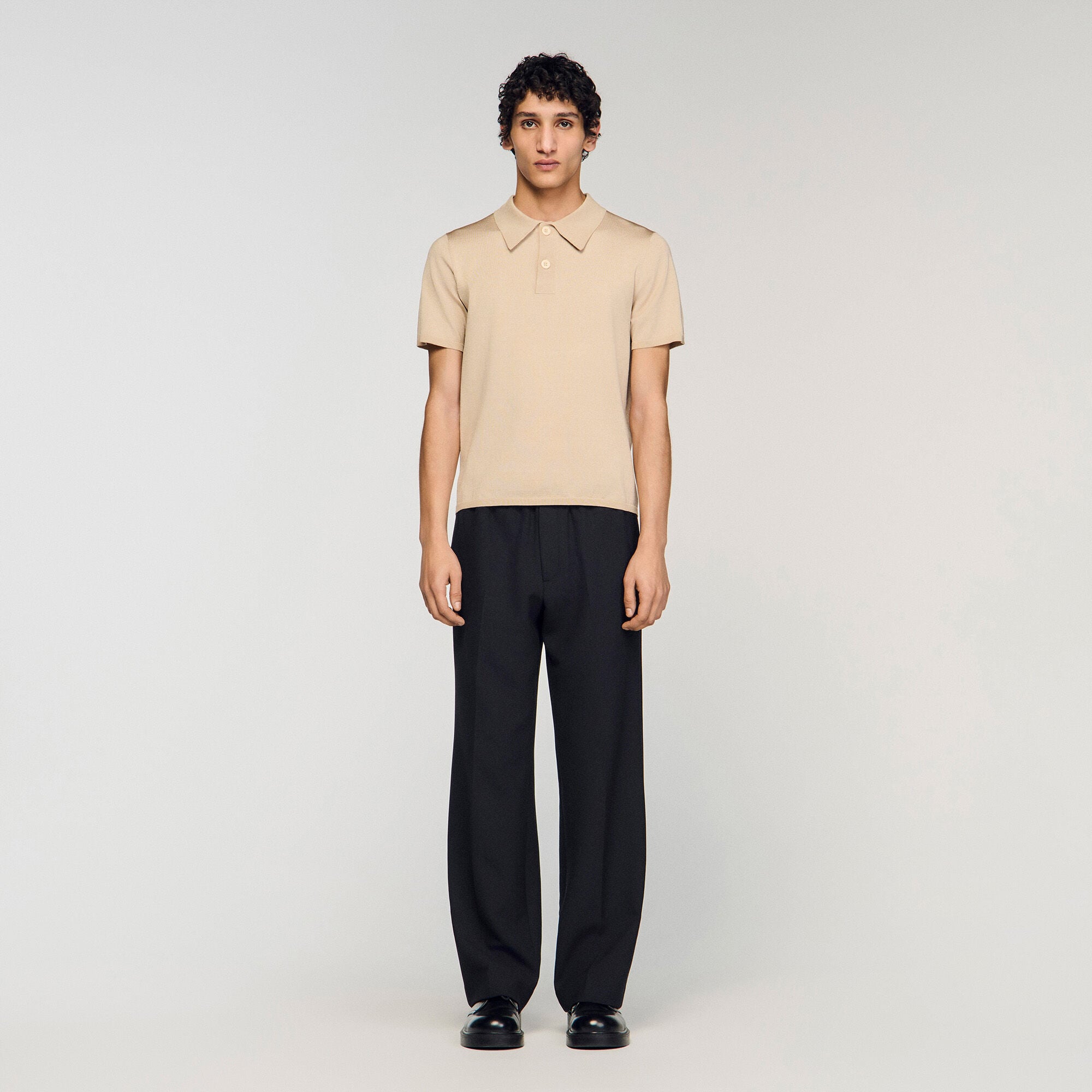 Short-sleeve knitted polo shirt in white for Men | Sandro Paris