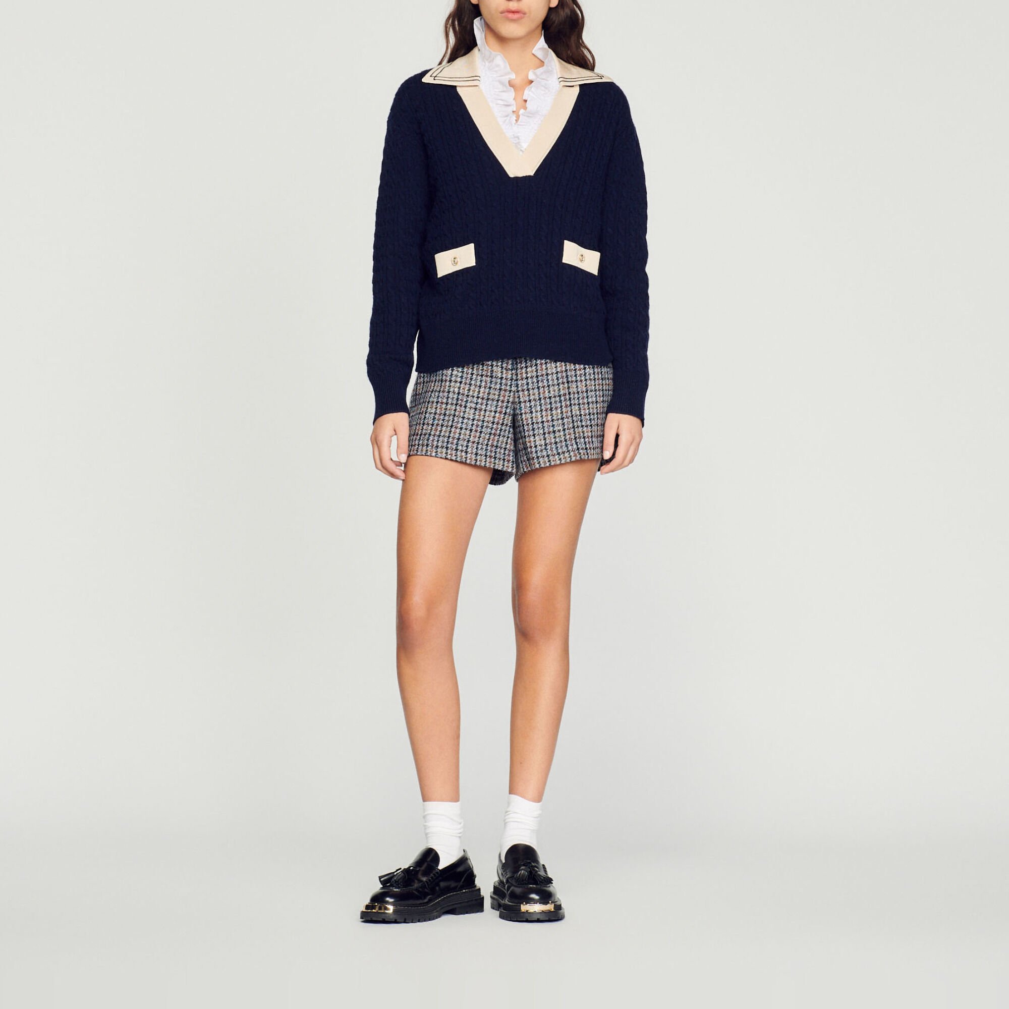 Cable knit sweater with low neckline