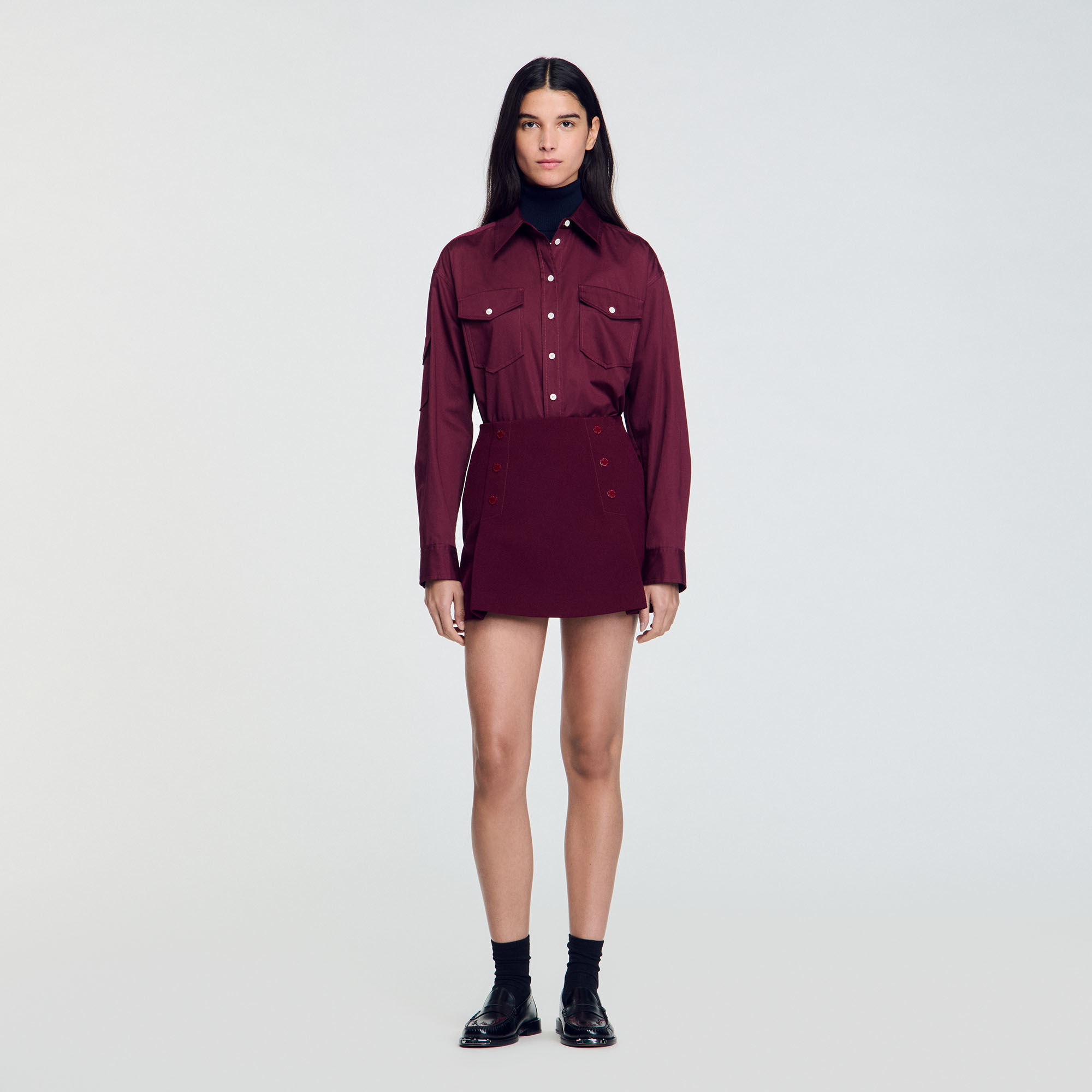 Short skirt with press studs