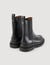 Ankle boots with notched sole