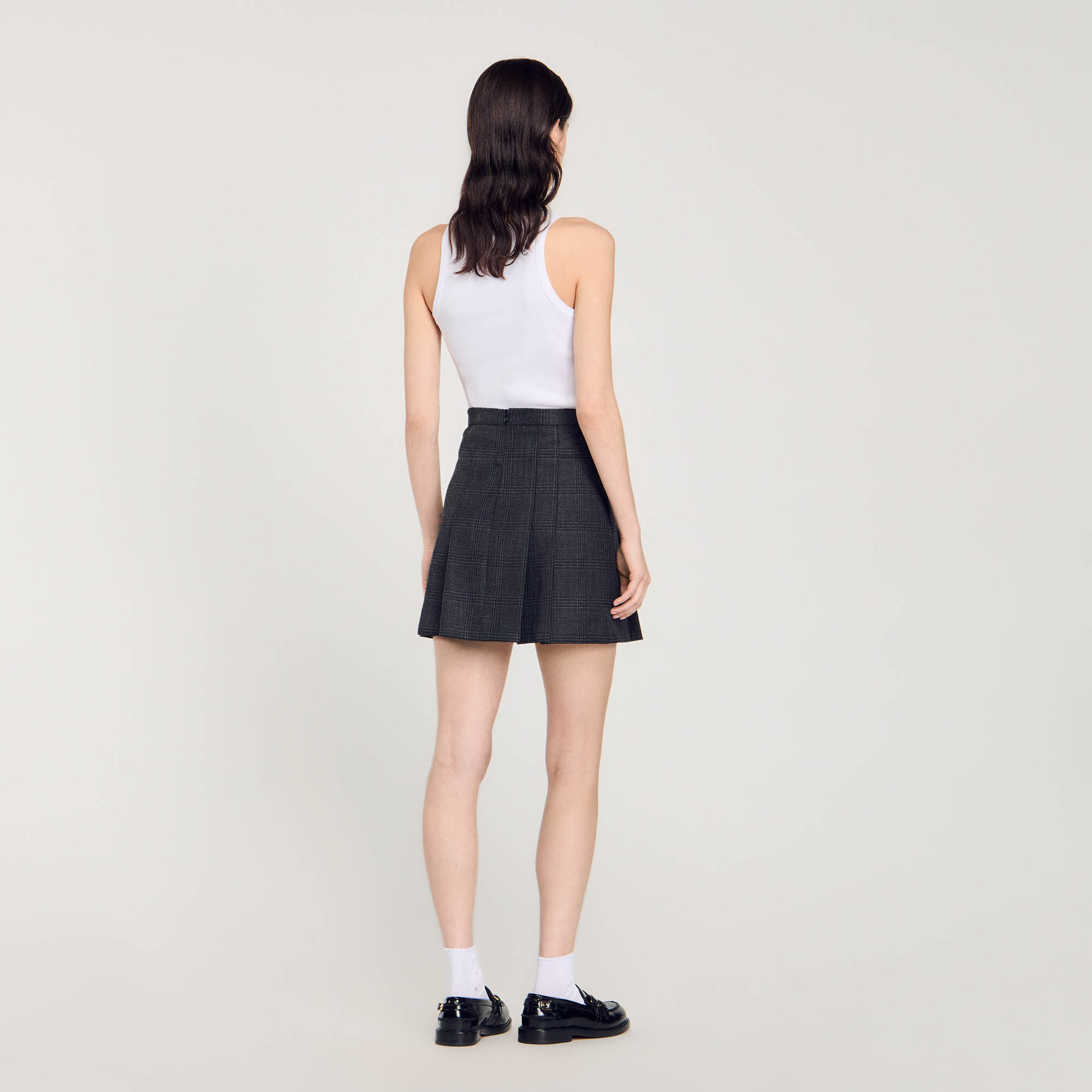 Short checked pleated skirt