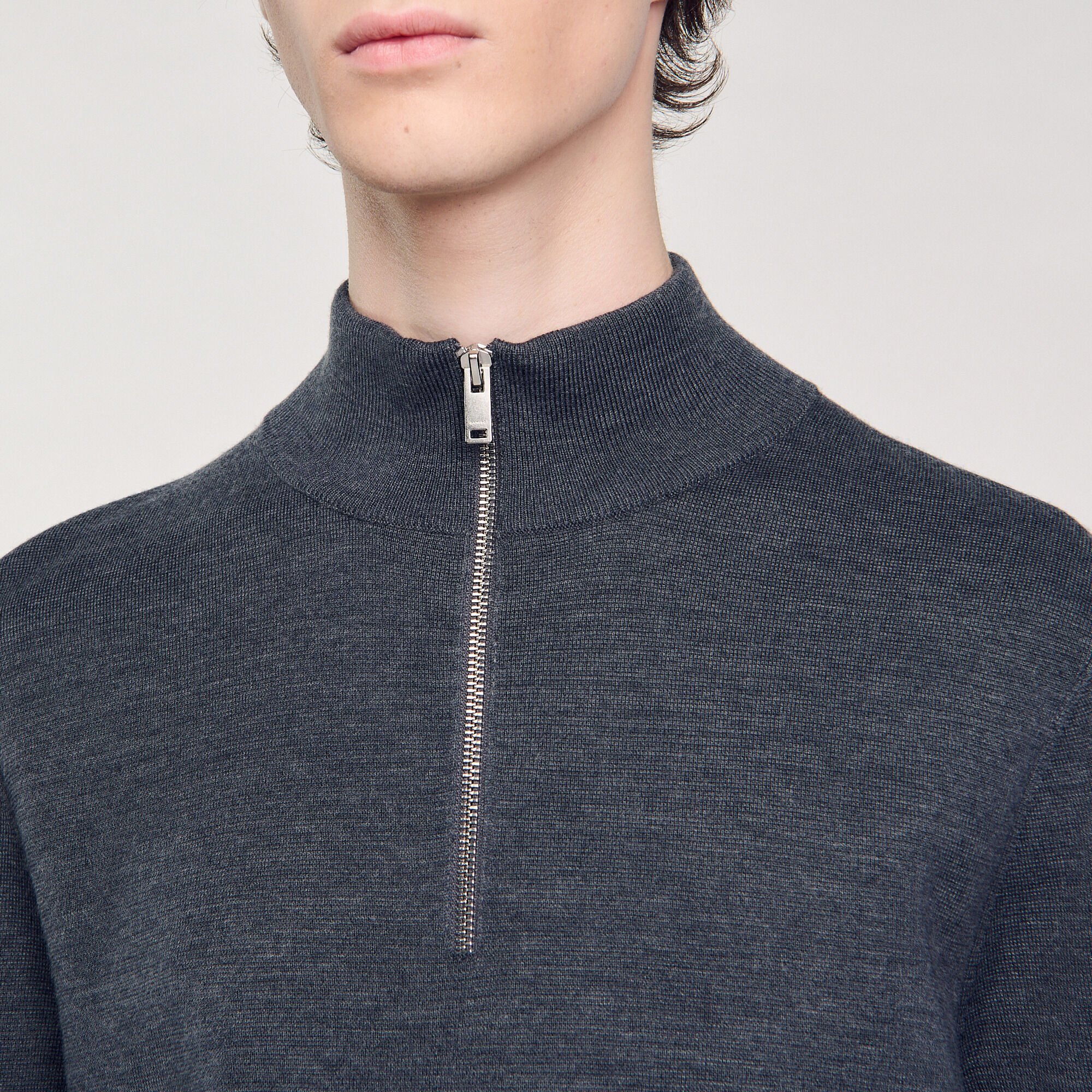 Wool sweater with zipped collar