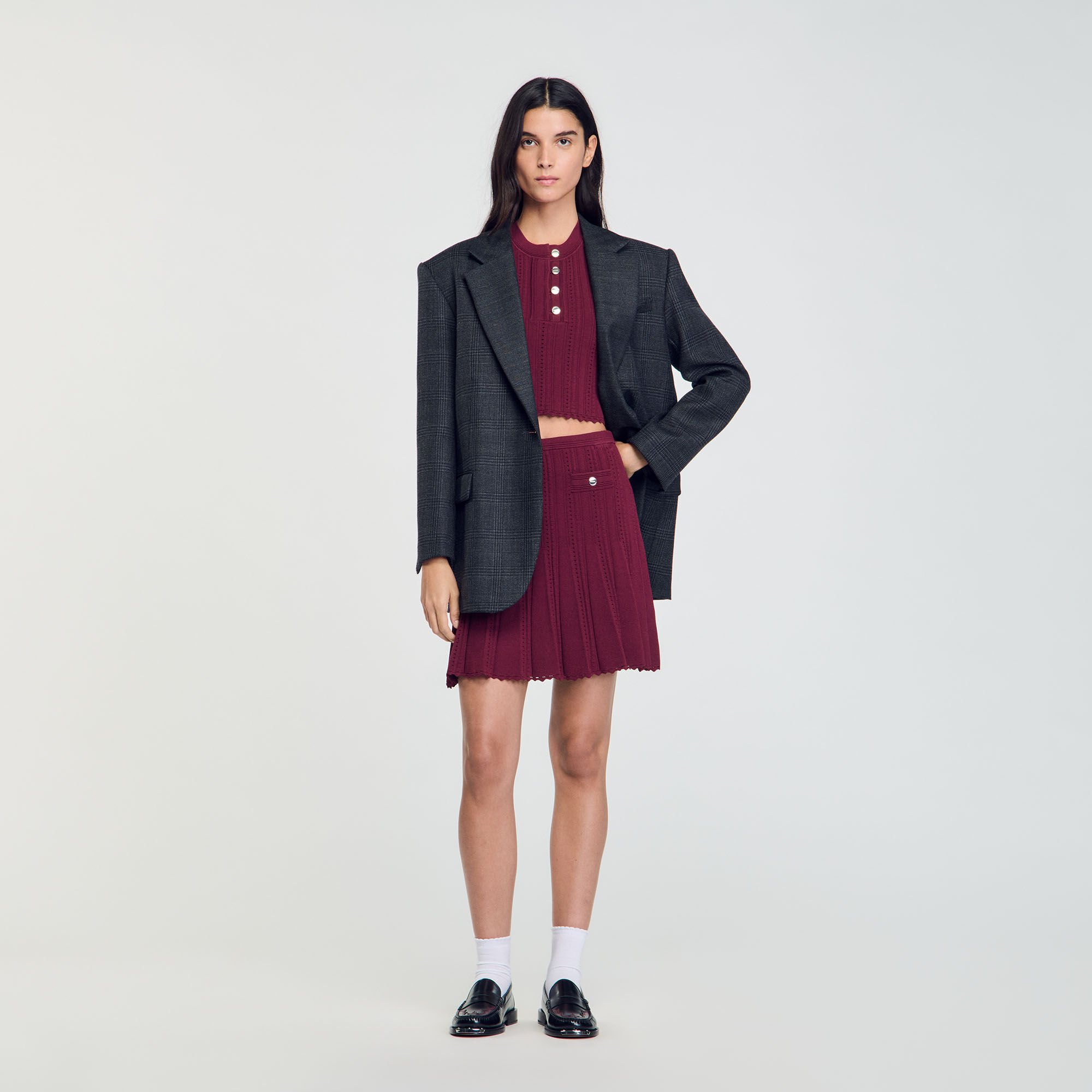 Short pleated knit skirt