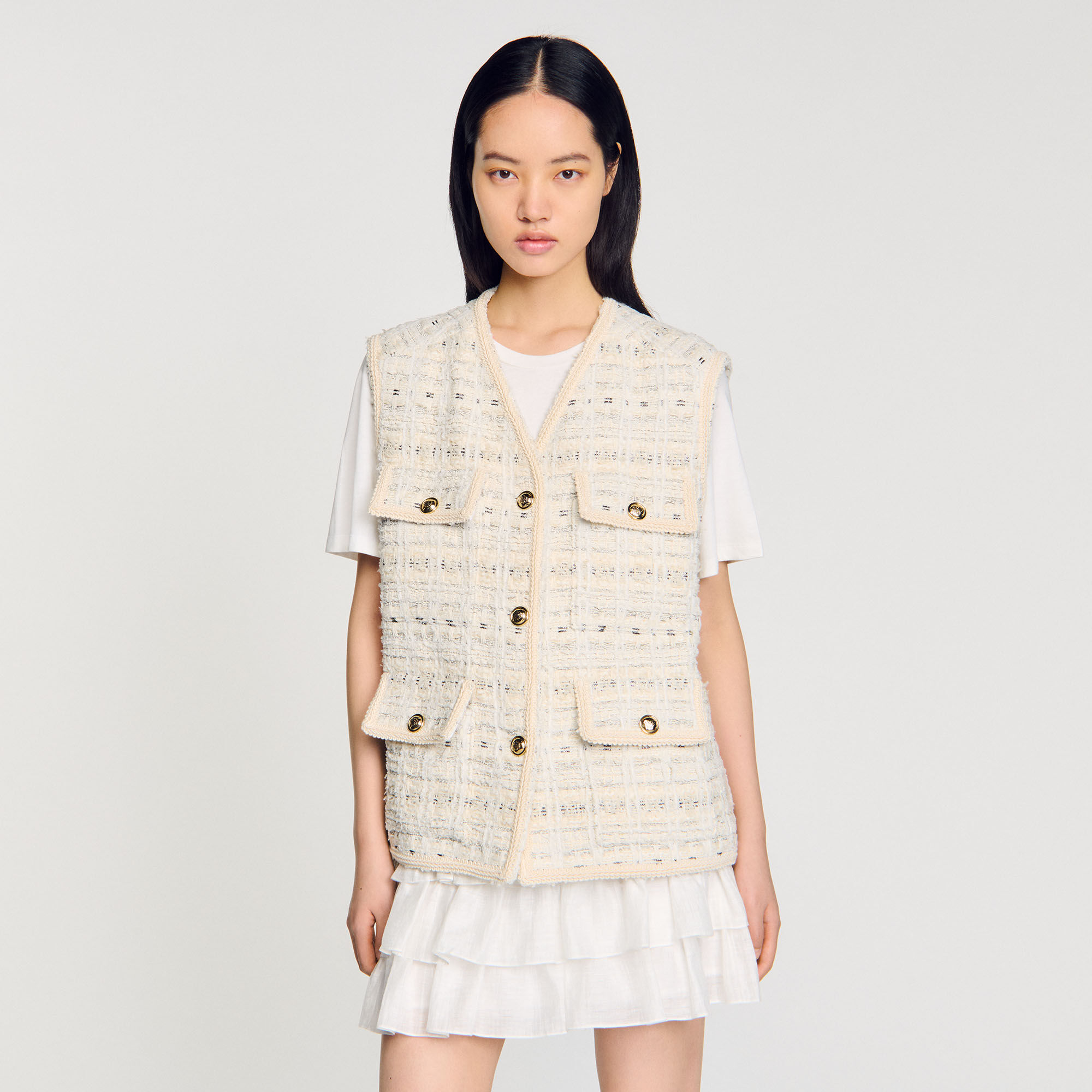 Sleeveless tweed jacket