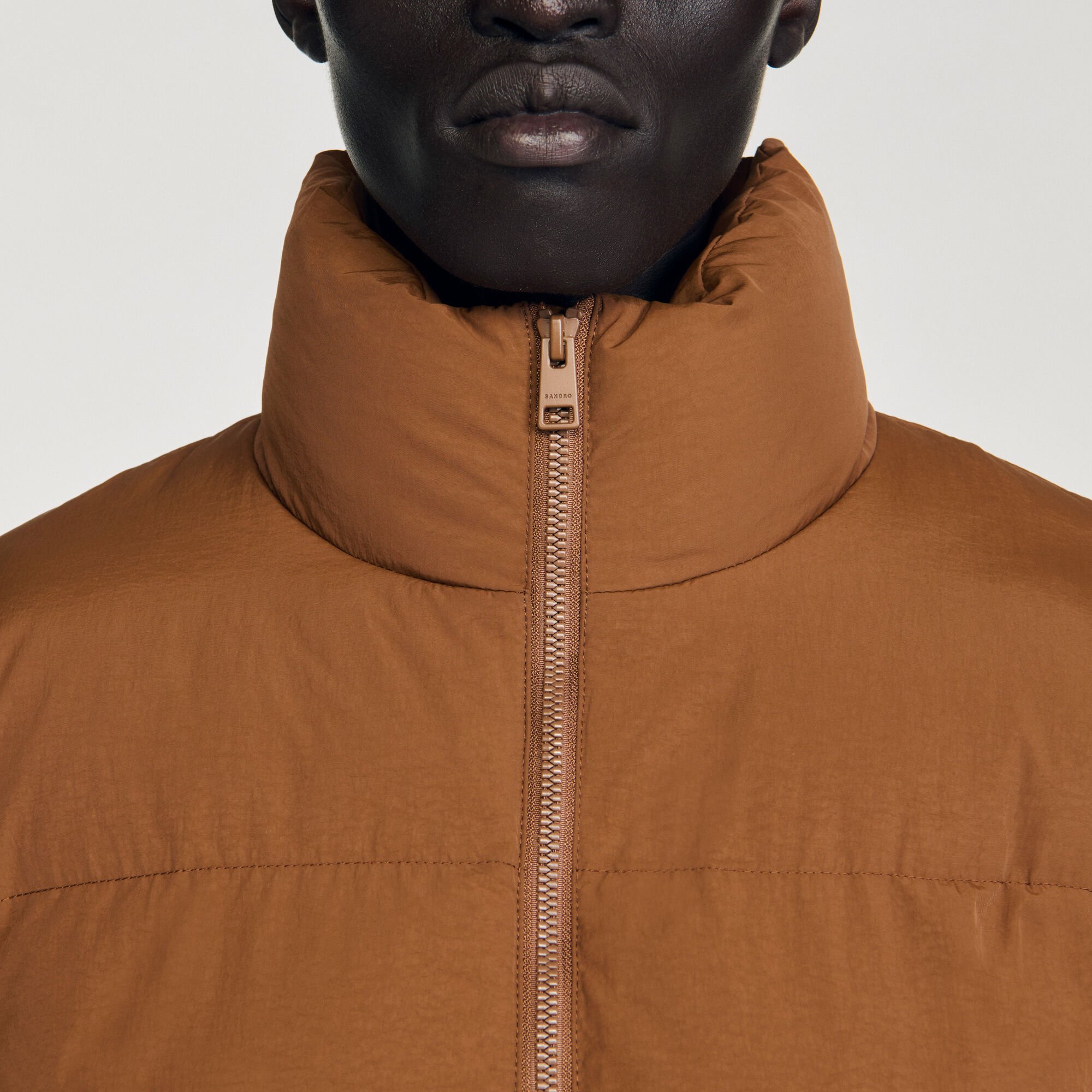 Hooded puffer with high collar