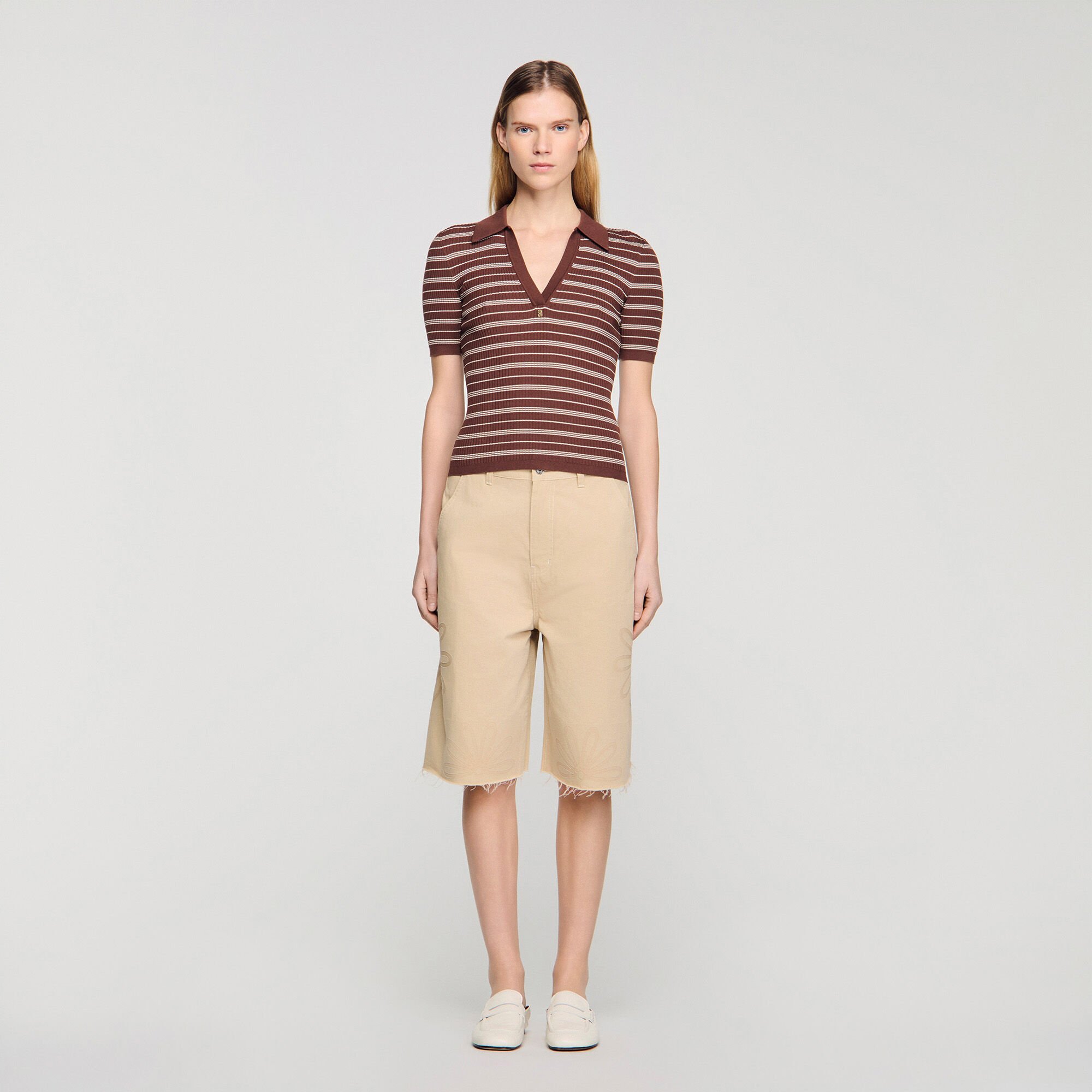 Striped V-neck polo sweater