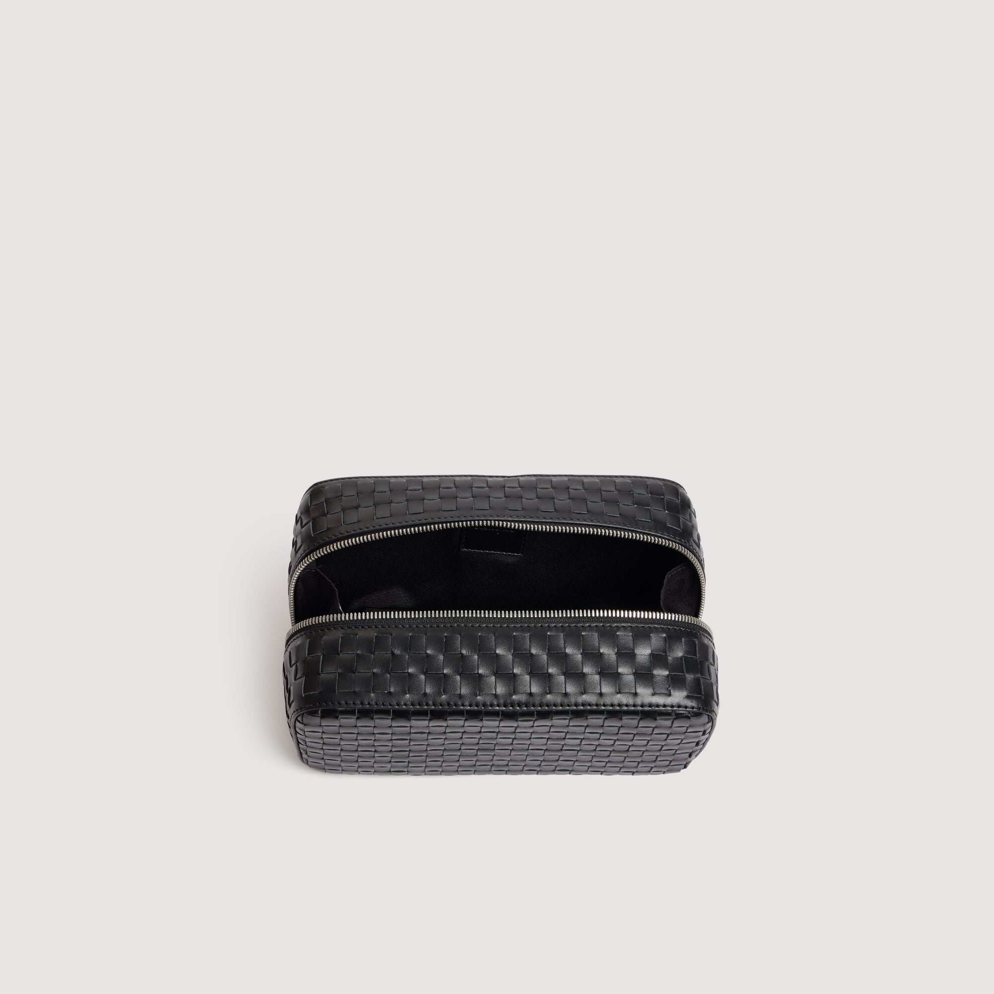 Woven leather toiletry bag - Men | Sandro