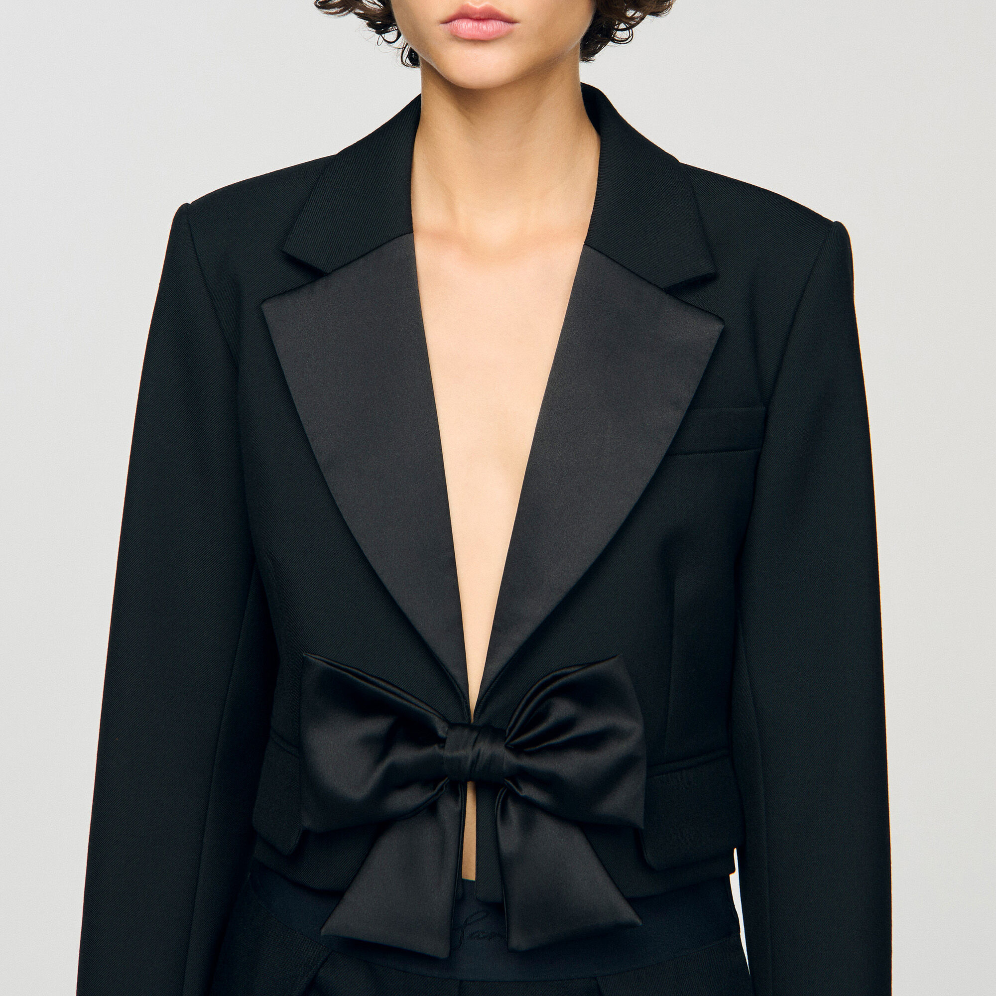 Short satin bow jacket