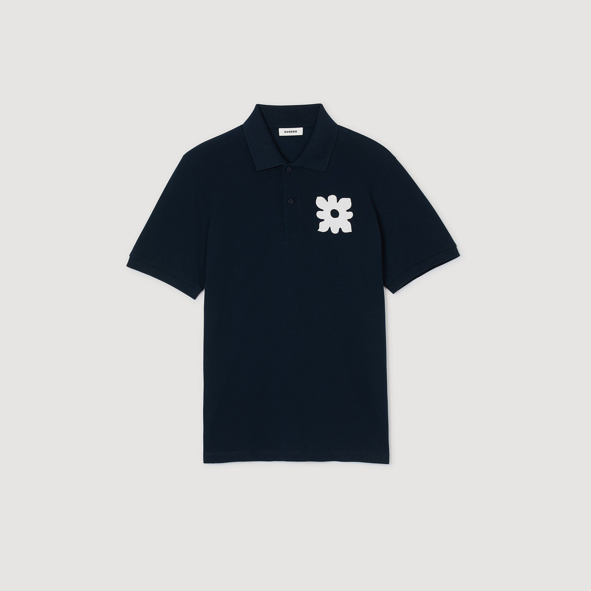 Polo shirt with flower patch