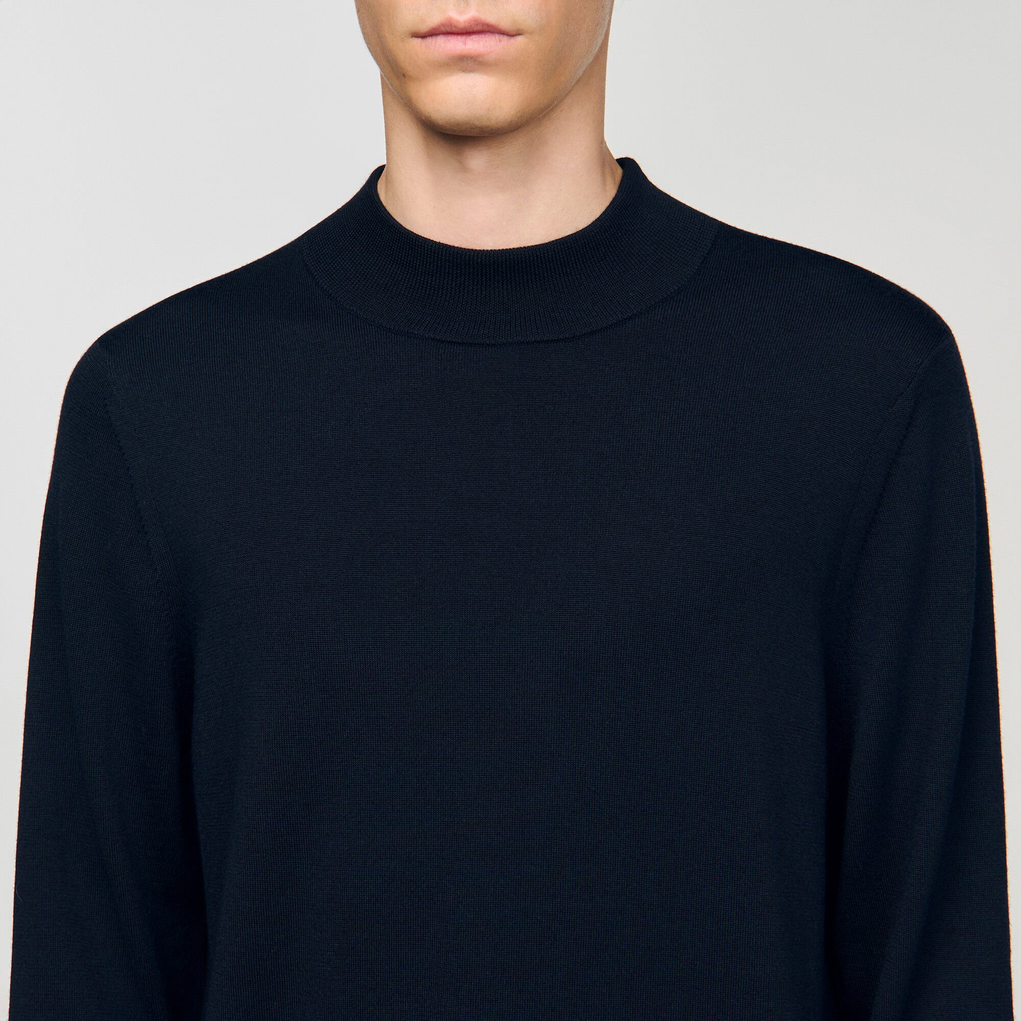Wool sweater with high neck