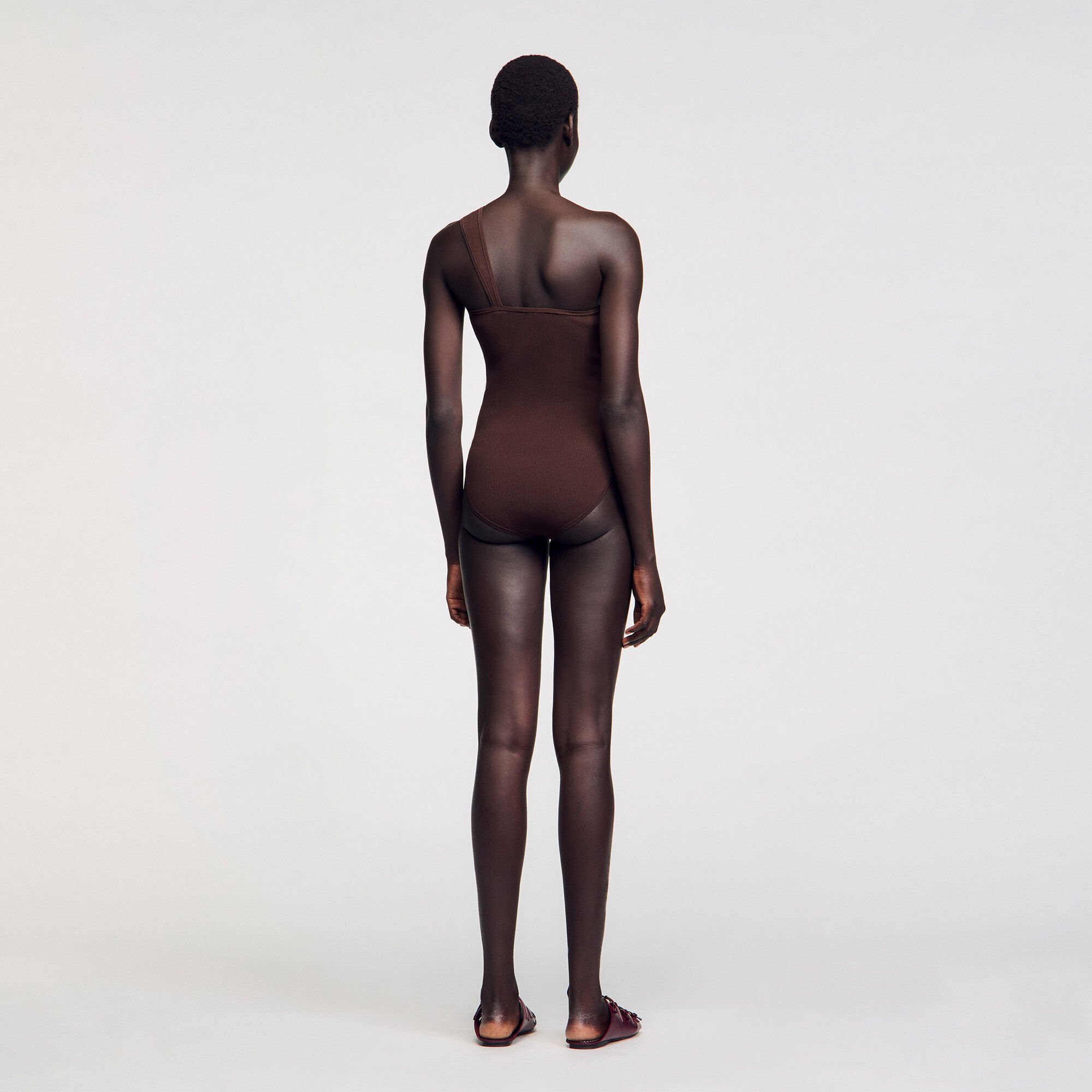Asymmetric leotard with bead detail