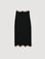 Long knitted skirt with chain detail