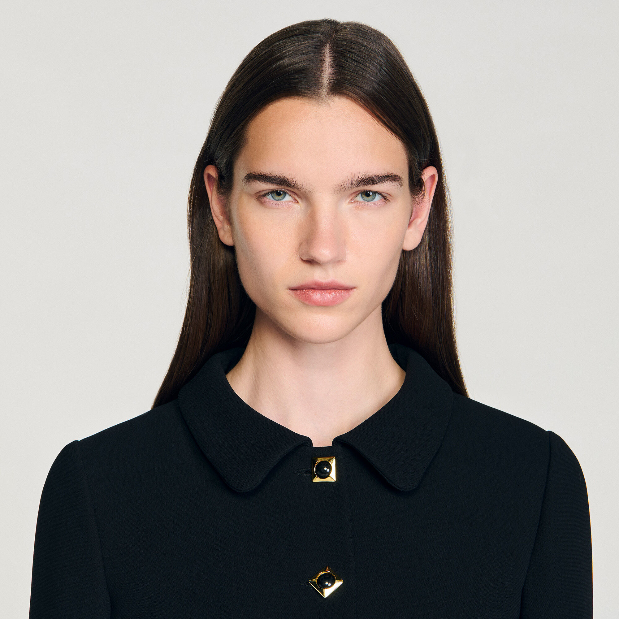 Cropped jacket with decorative buttons