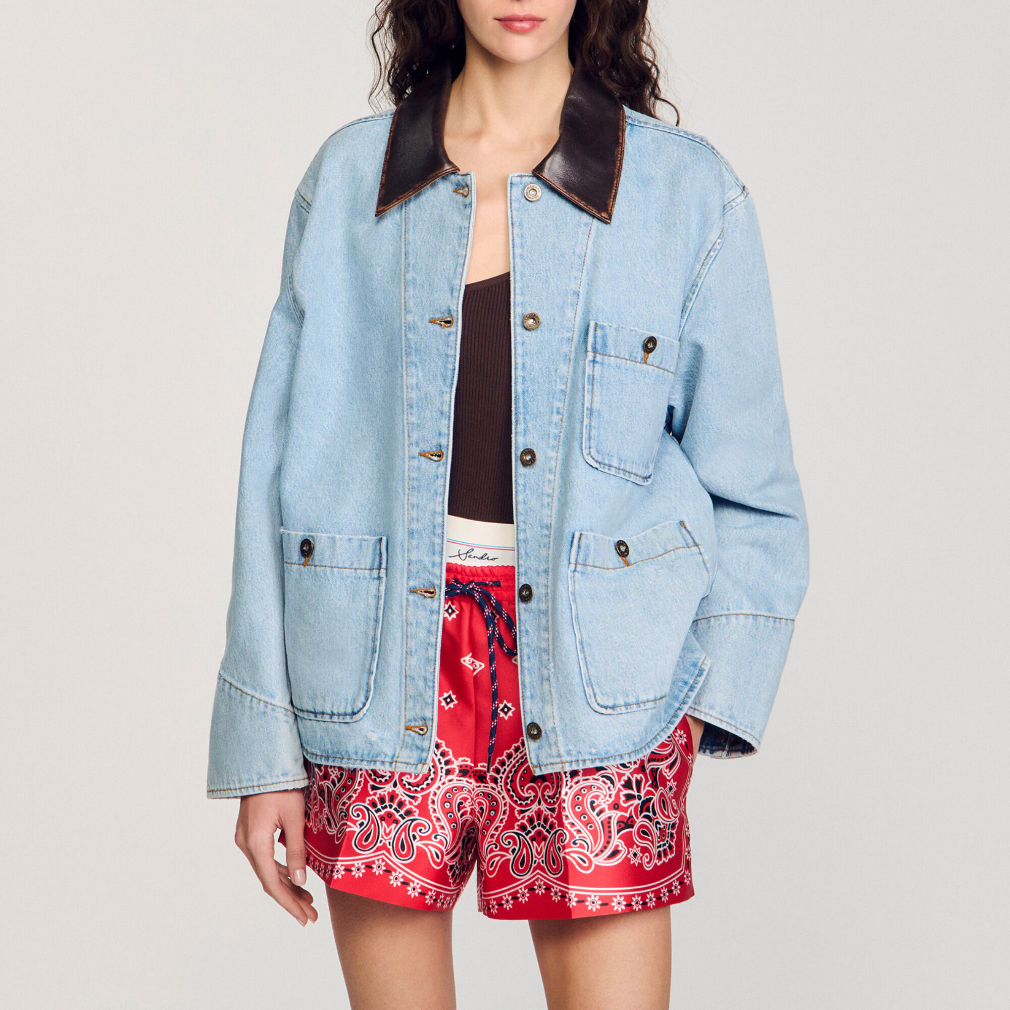 Denim jacket with leather collar