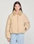 Puffer jacket with shearling collar