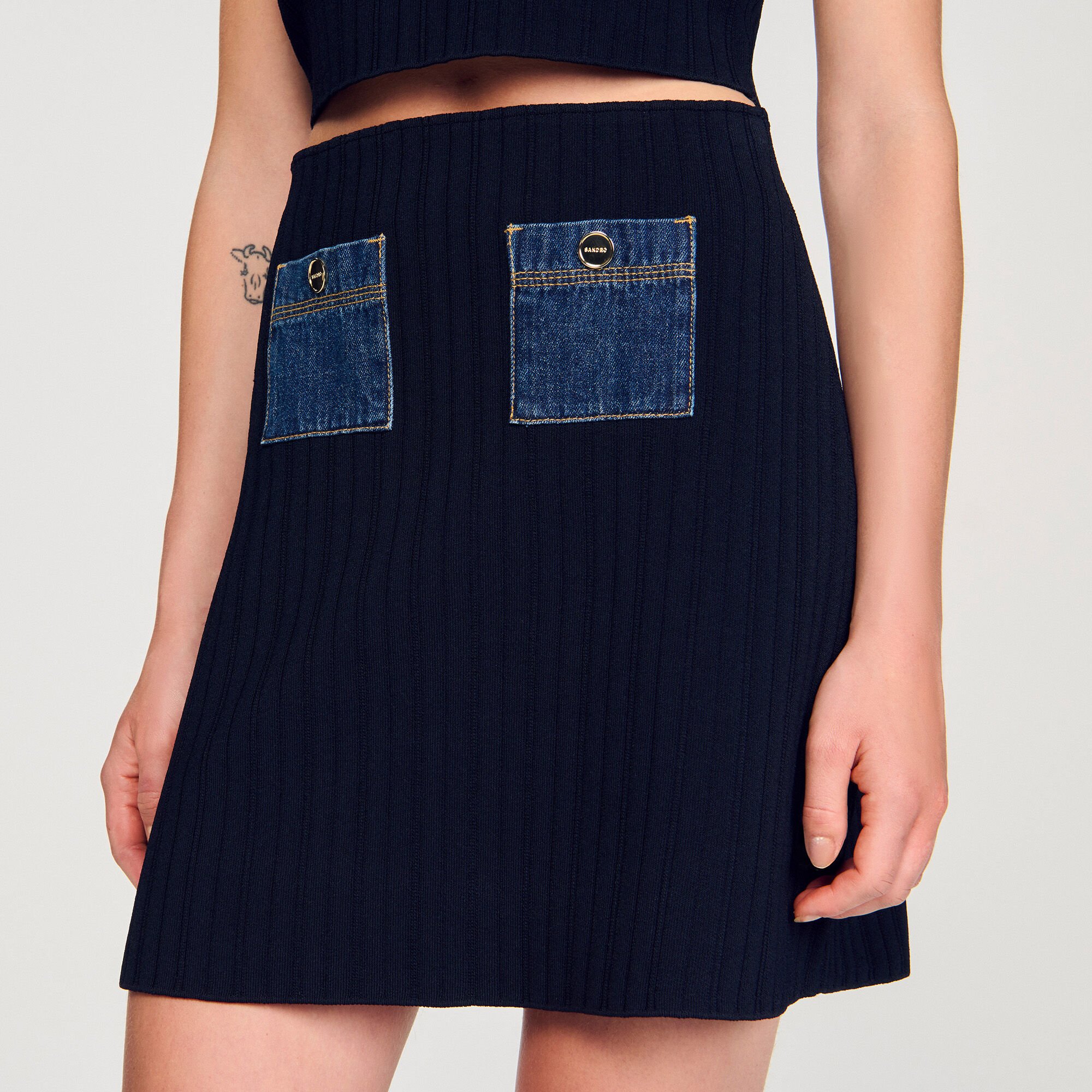 Mini knit and denim skirt