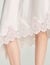 Asymmetrical satin skirt with lace