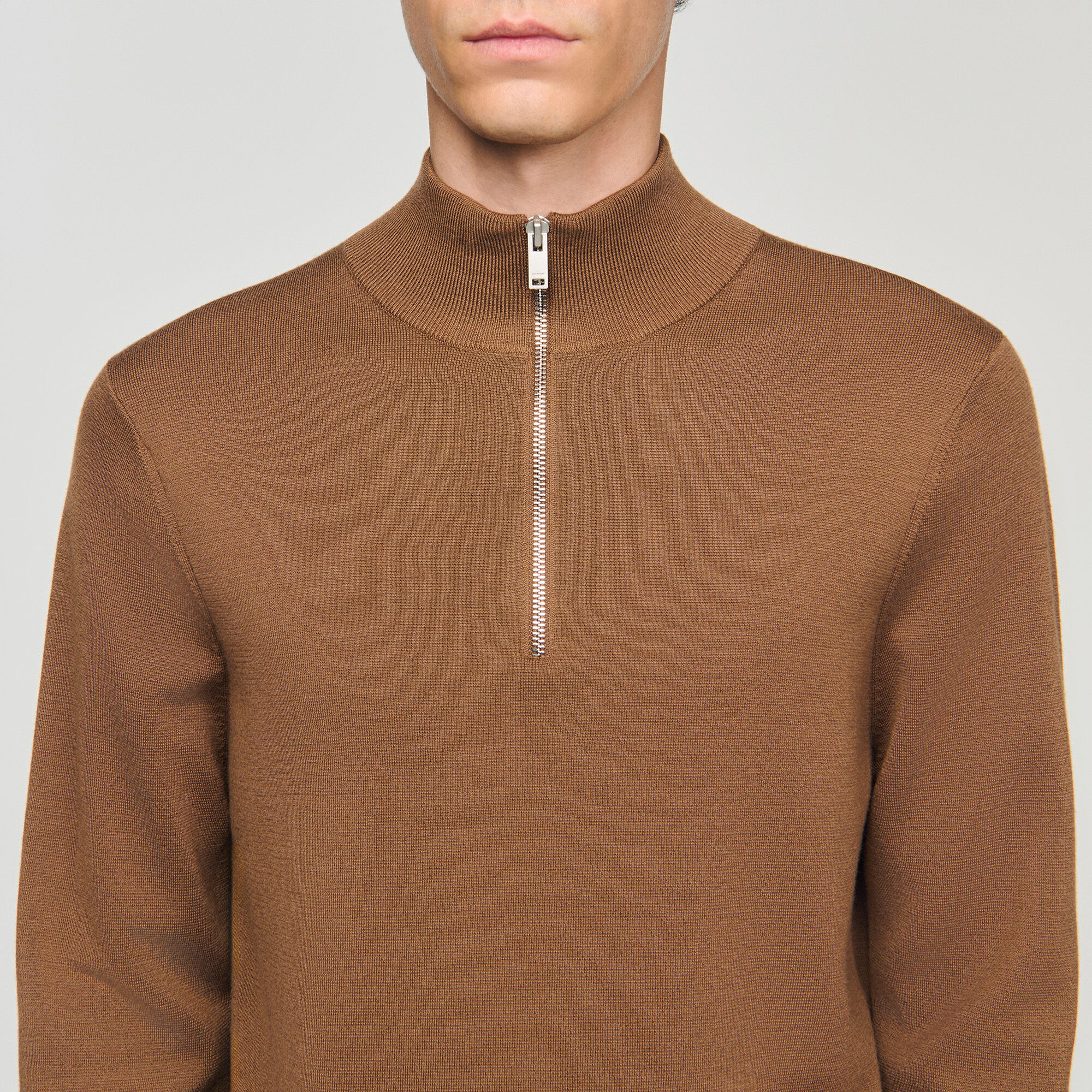 Wool sweater with zipped collar