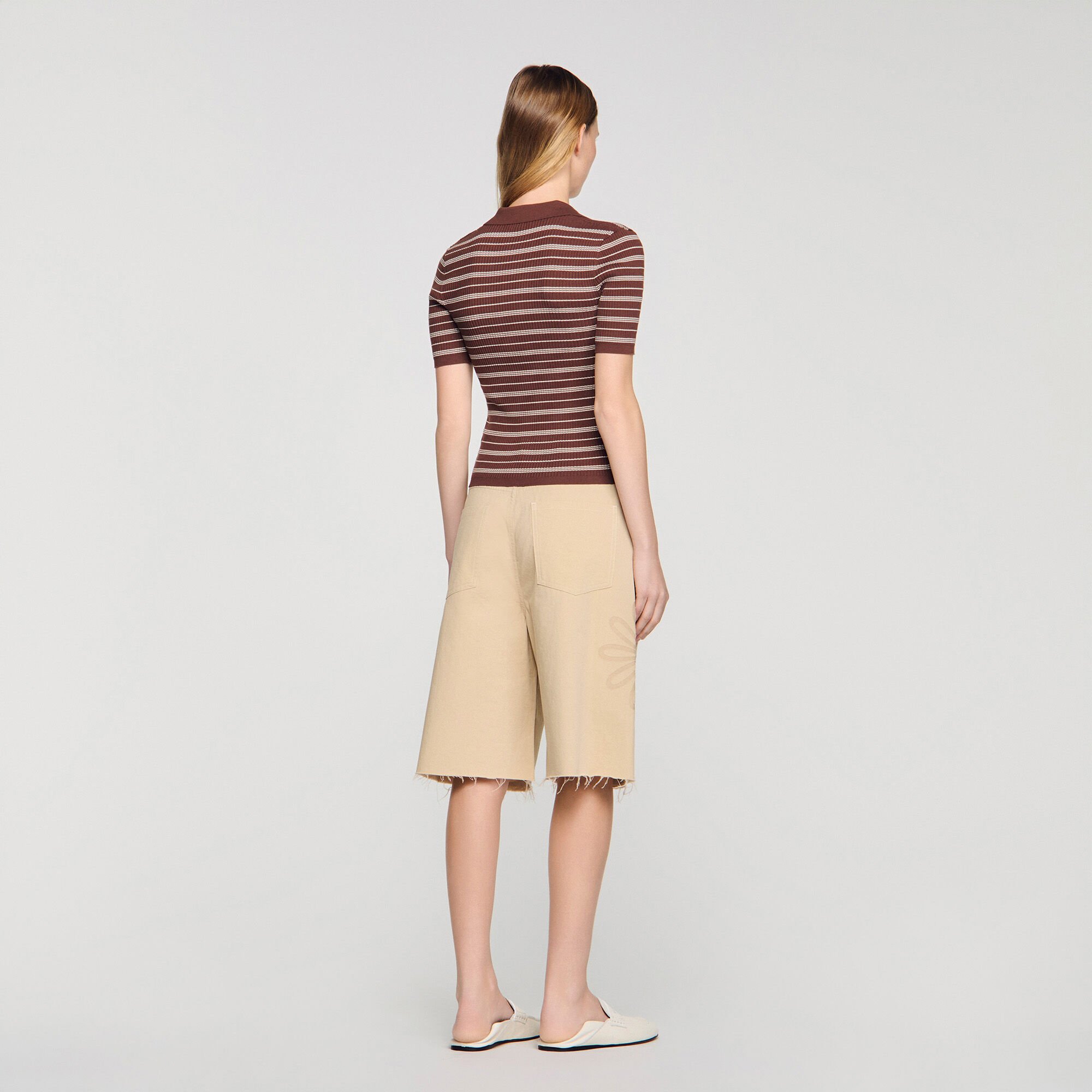 Striped V-neck polo sweater