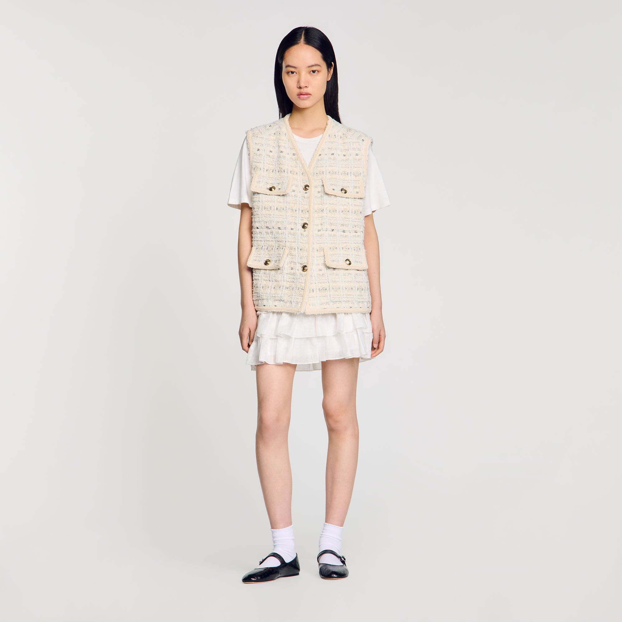 Sleeveless tweed jacket