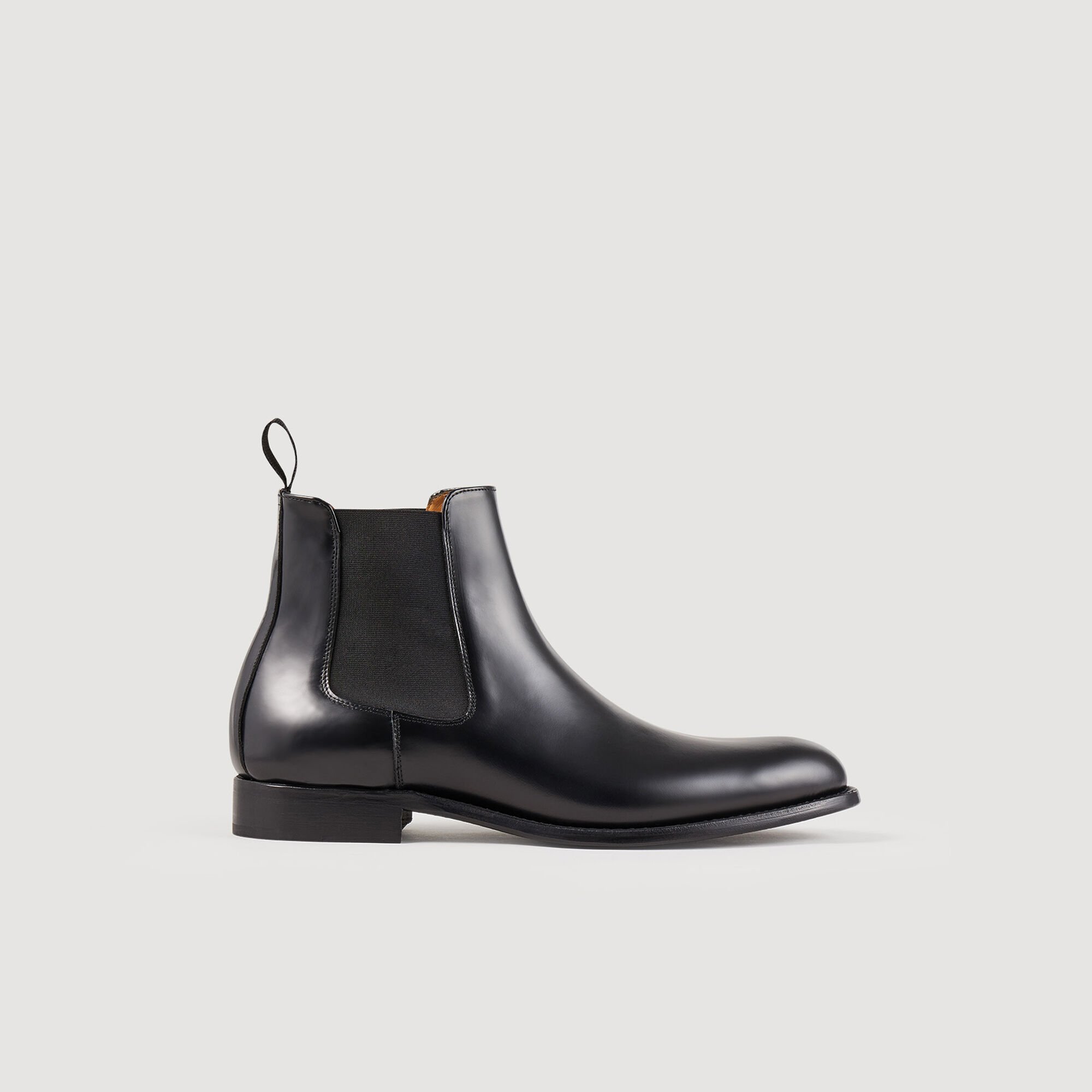 Black ankle boots with elastic sides on sale