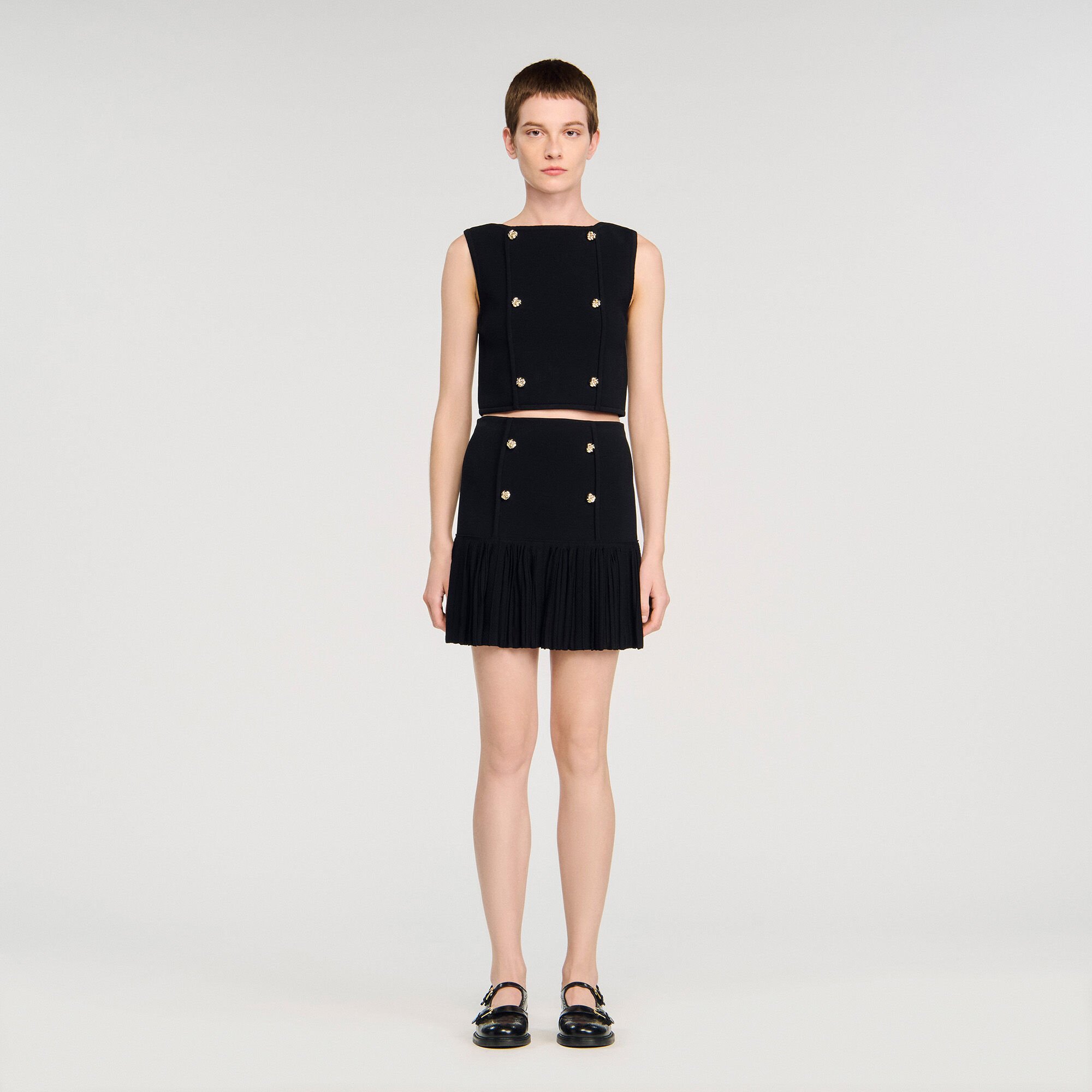 Mini pleated knit skirt