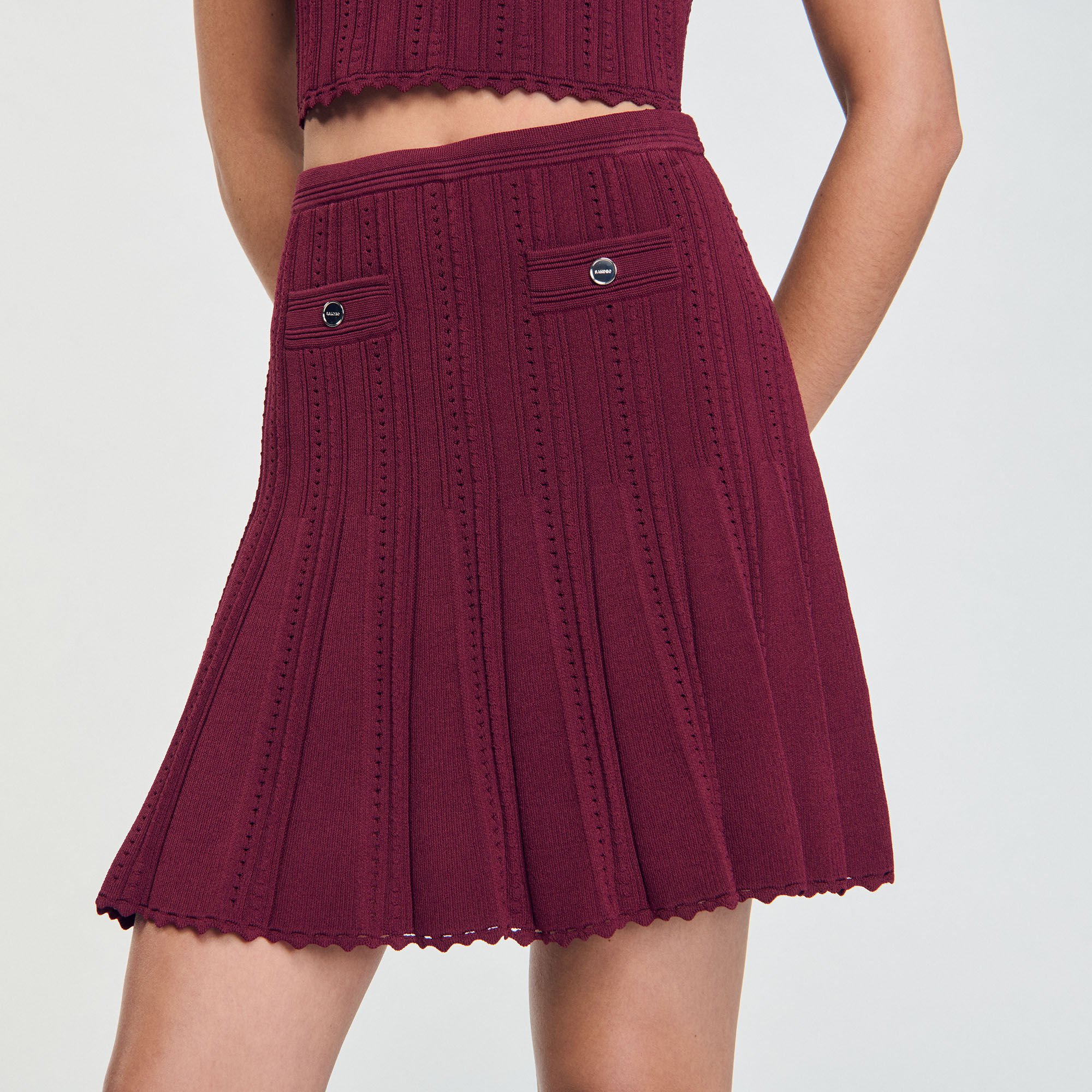 Short pleated knit skirt