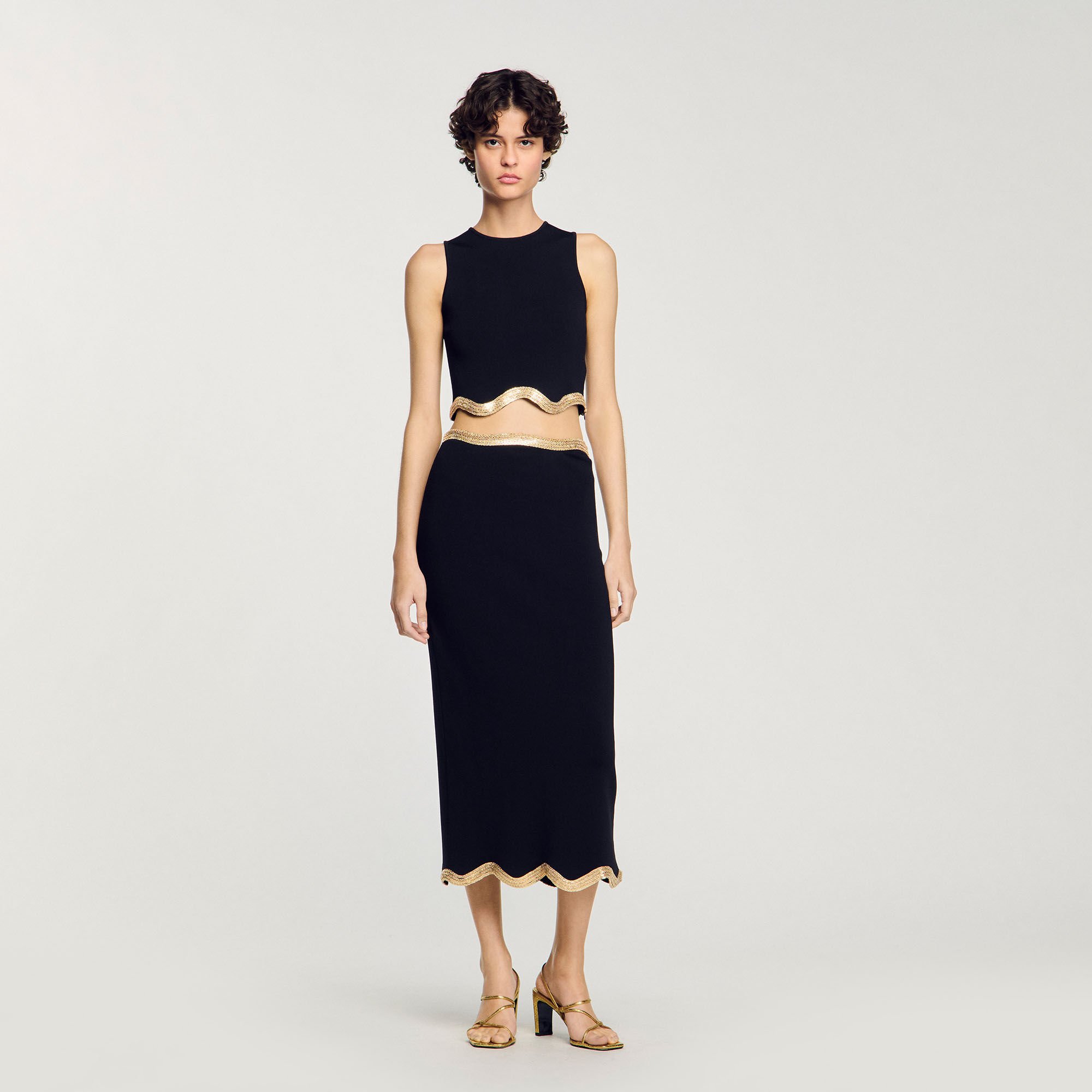 Long knitted skirt with chain detail