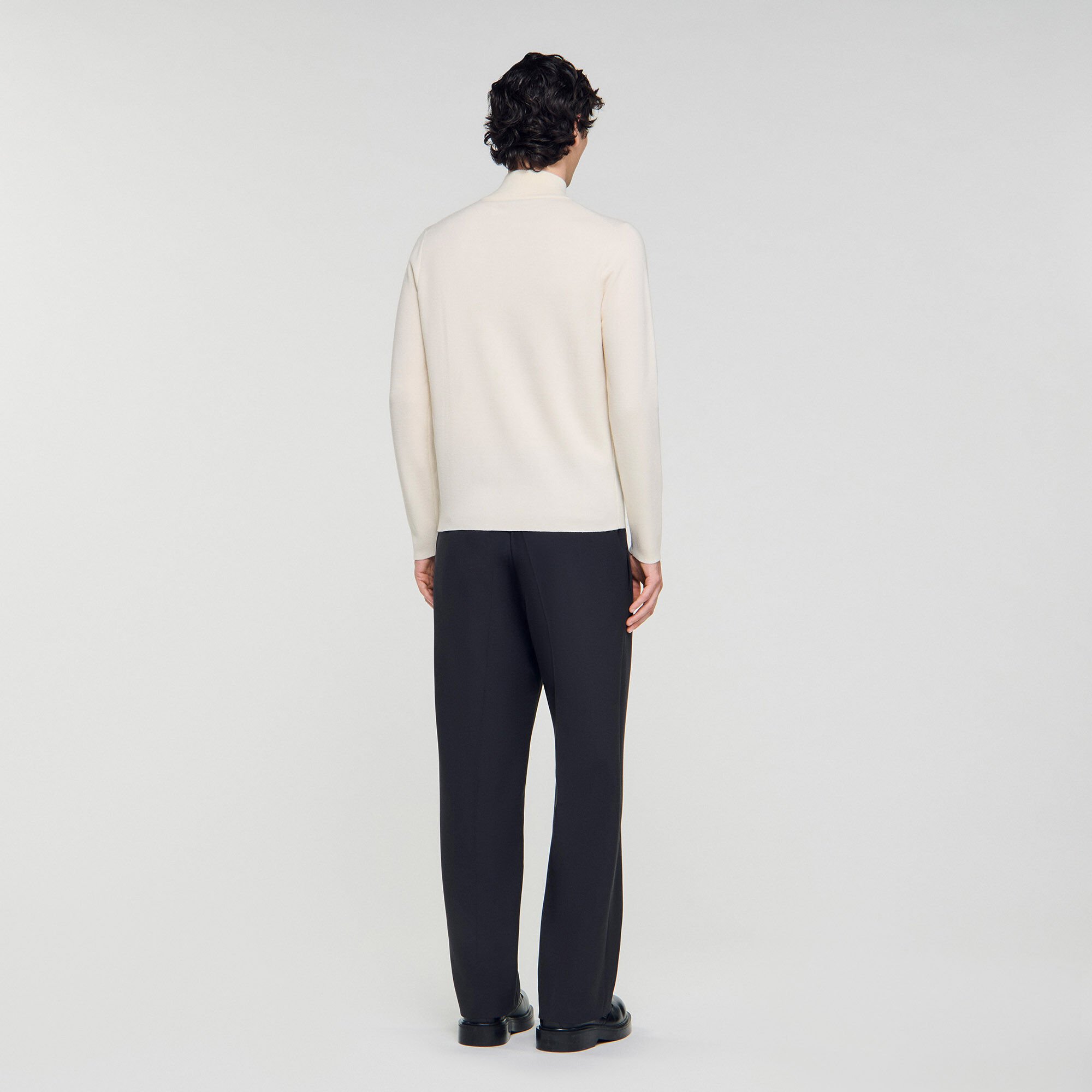 Wool sweater with zipped collar