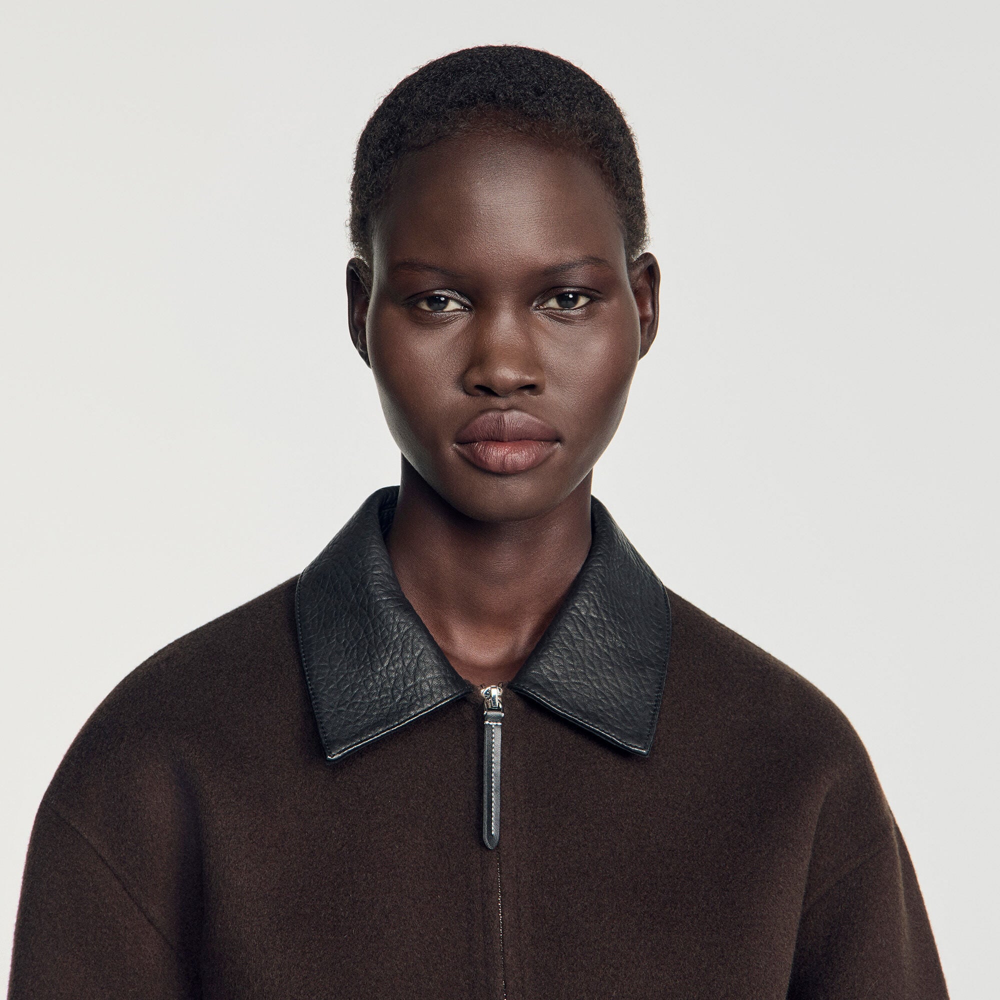 SANDRO ジャケット　DOUBLE-FACED JACKET Double-faced leather collar jacket in Black Brown for Women