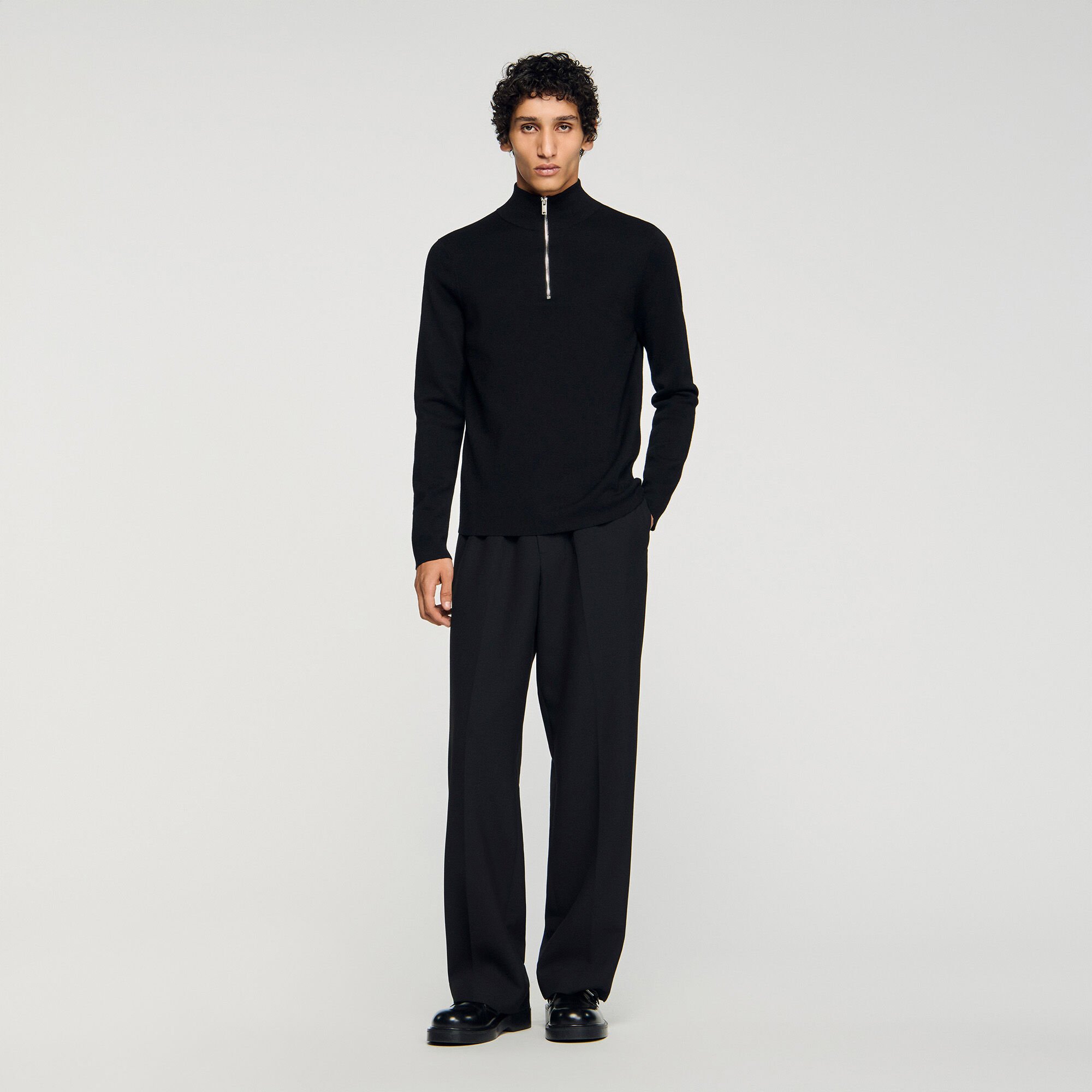 Wool sweater with zipped collar